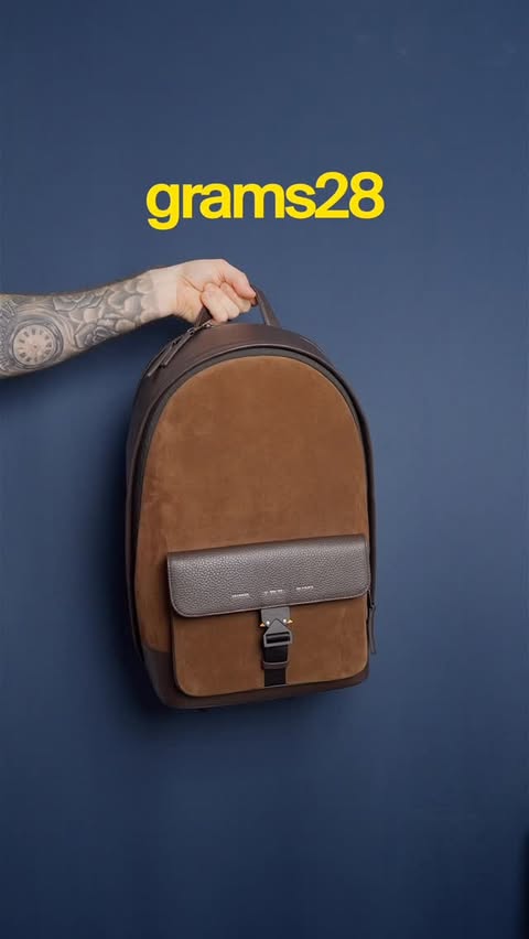 Instagram post by @layton_video for GRAMS28. Caption reads: [...] This 151 Stealth backpack from @grams28 is....