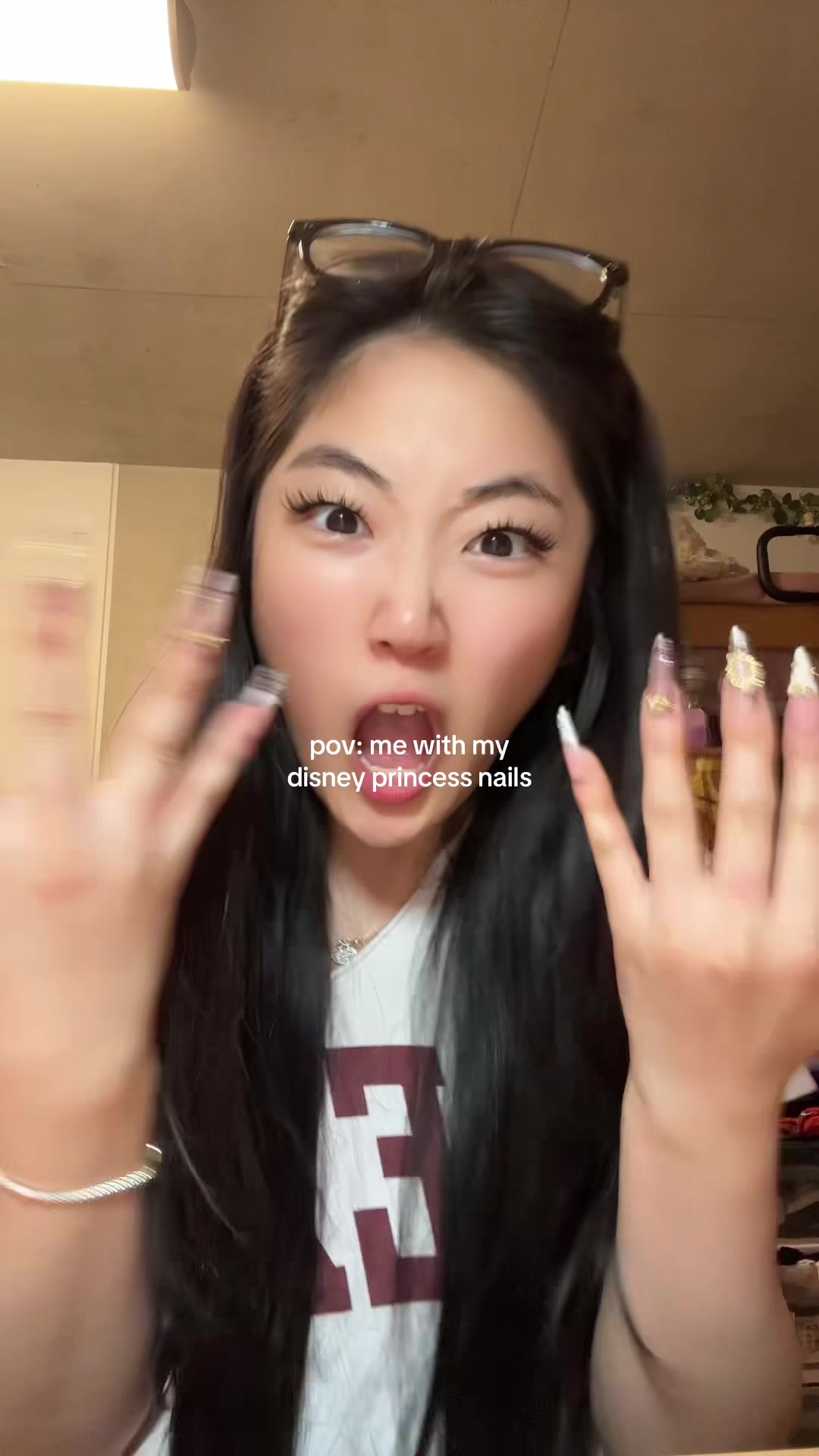 TikTok post by @n.j.lov for Nailphoria. Caption reads: [...] UNTIL I AM WEARInG A DISNEY DRESS....