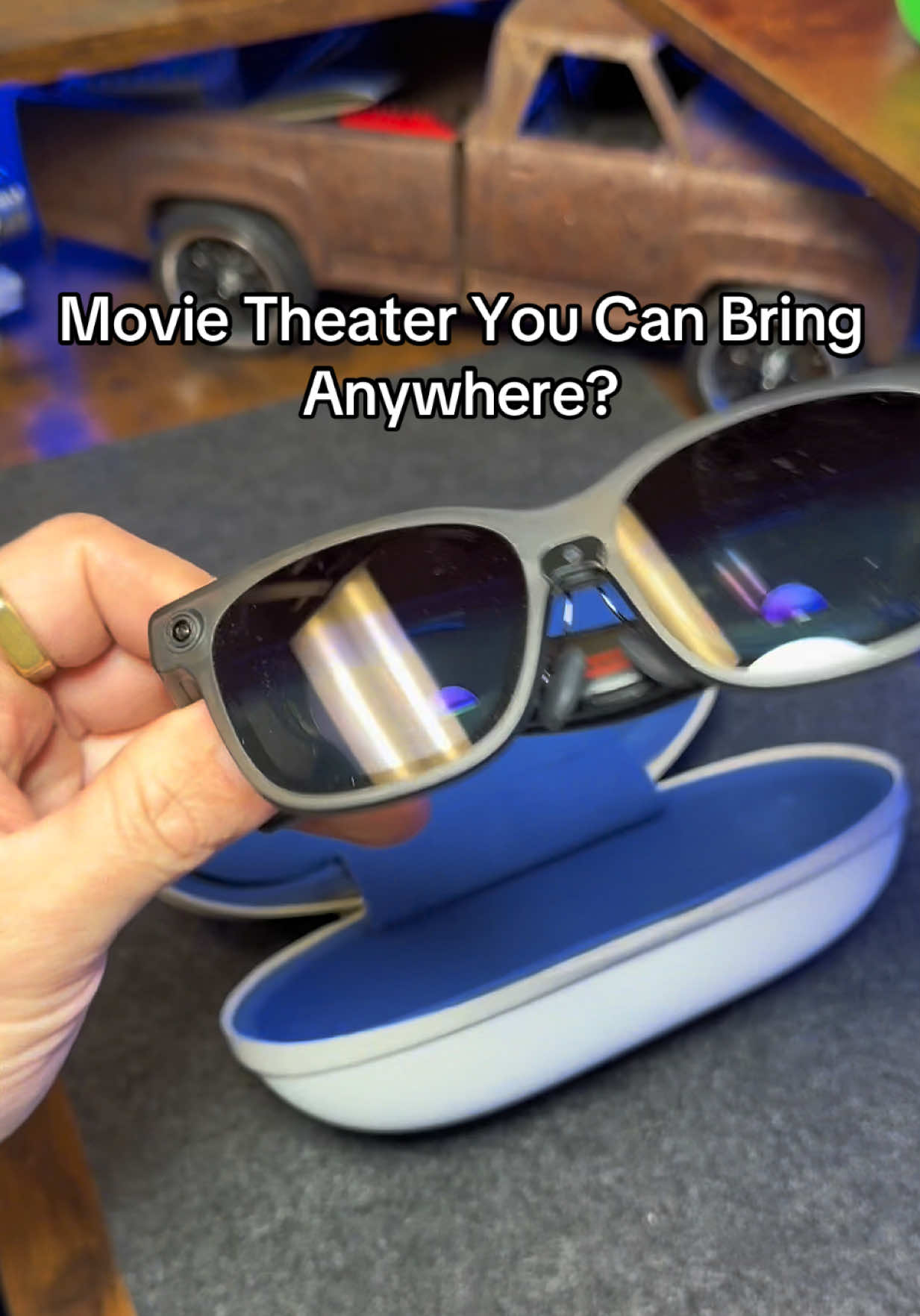 TikTok post by an influencer for Viture. Caption reads: [...] or a whole movie theater? @VITURE US....