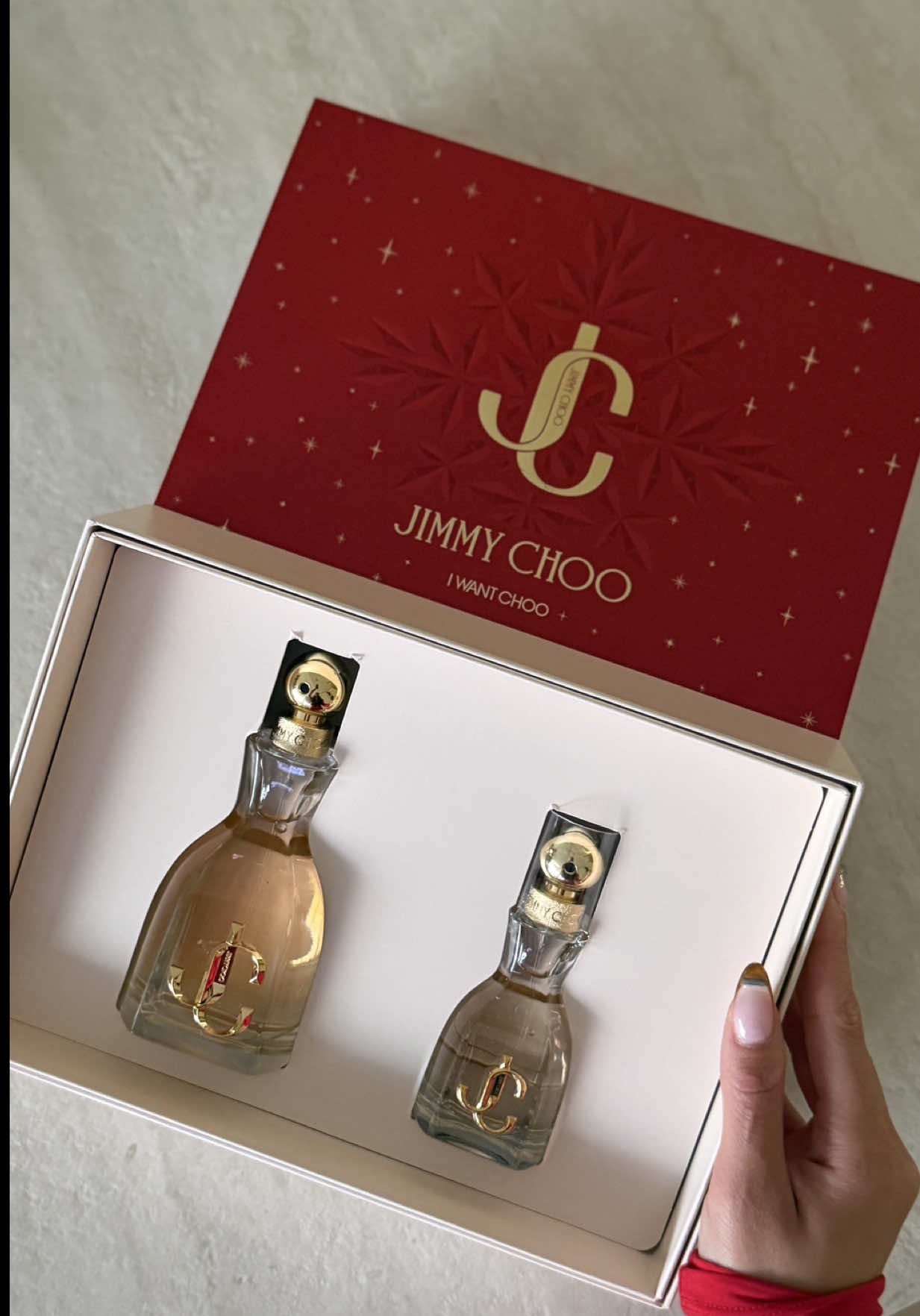 TikTok post by @allyiahsface for Jimmy Choo. Caption reads: [...] perfect holiday set for me and you. @Jimmy....