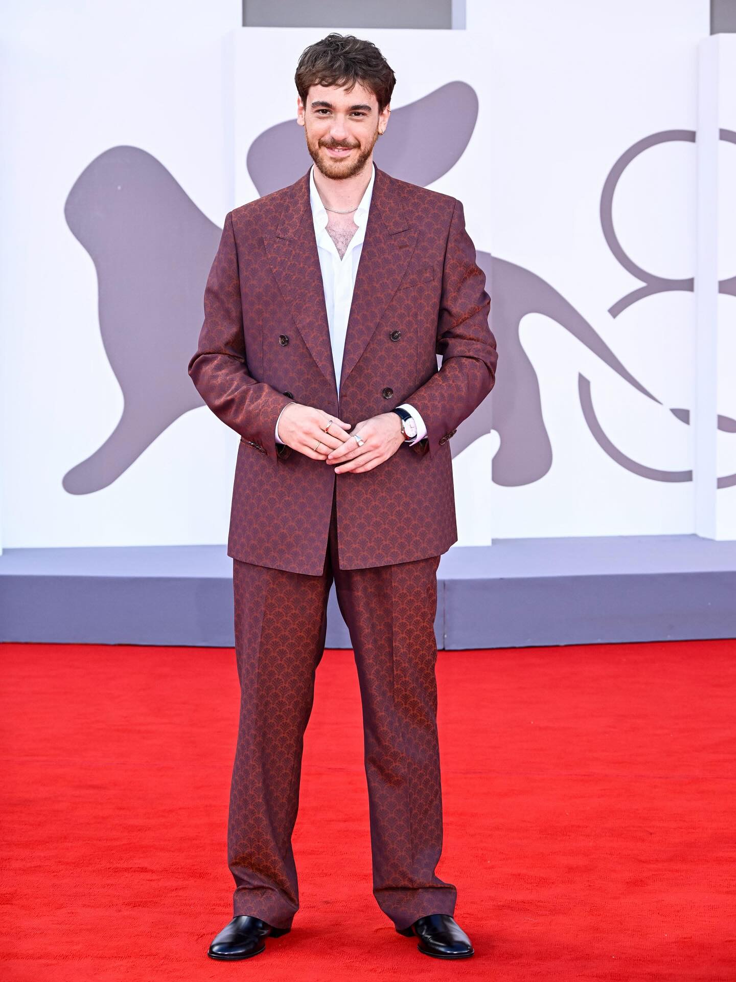 Instagram post by @fe_cesari for OMEGA. Caption reads: Venezia 82 

Look @etro 
Jewels @dodojewels 
Watch....