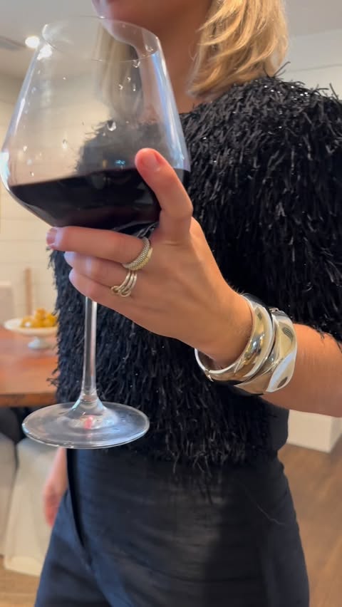 Instagram post by @meredithwyche for Chateau Ste. Michelle Winery. Caption reads: get ready with me for a…cozy night in…or girls....