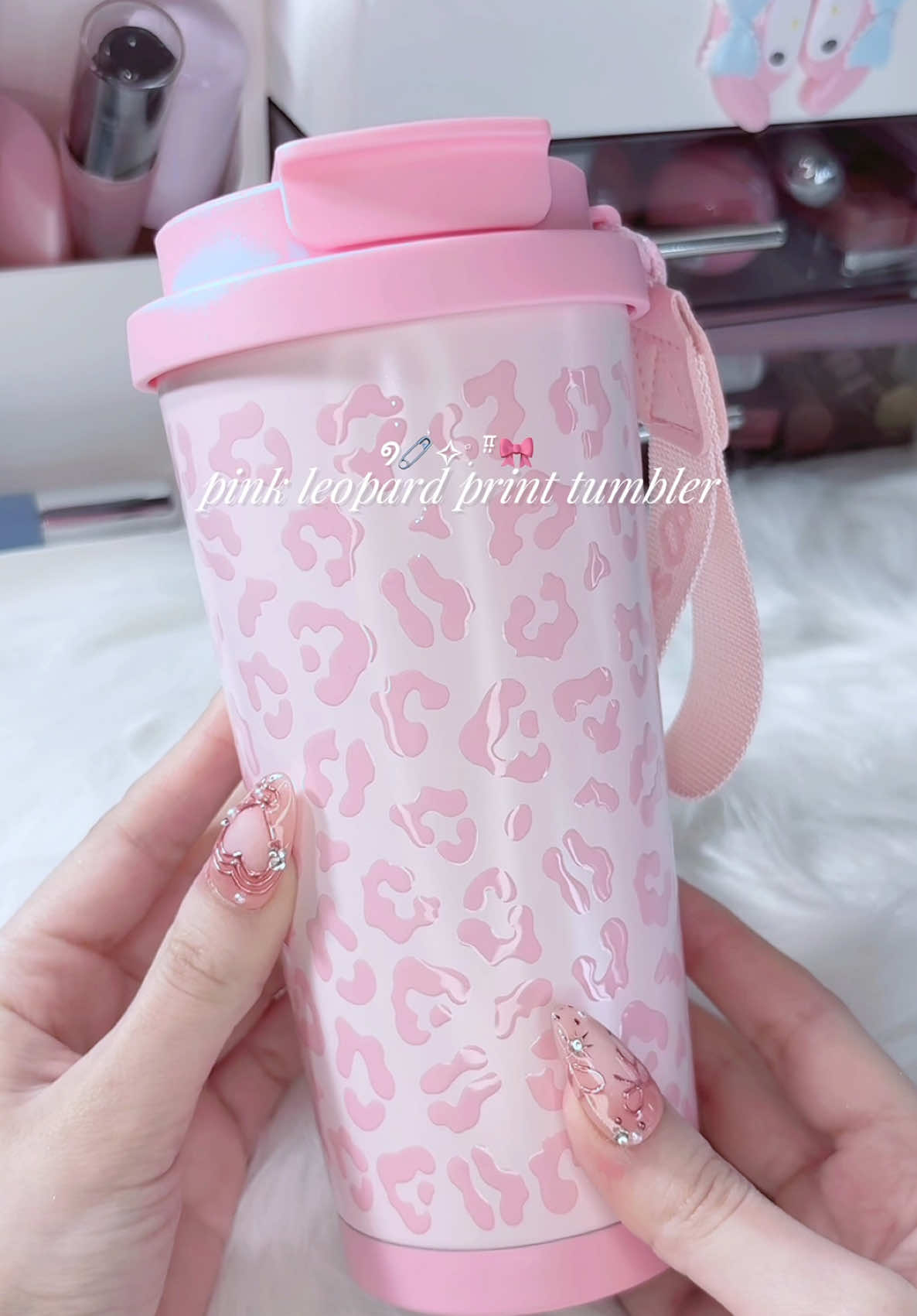 TikTok post by @beauty4ssma for Sandjest. Caption reads: pink leopard print tumbler from @SANDJEST 💕 #pink....