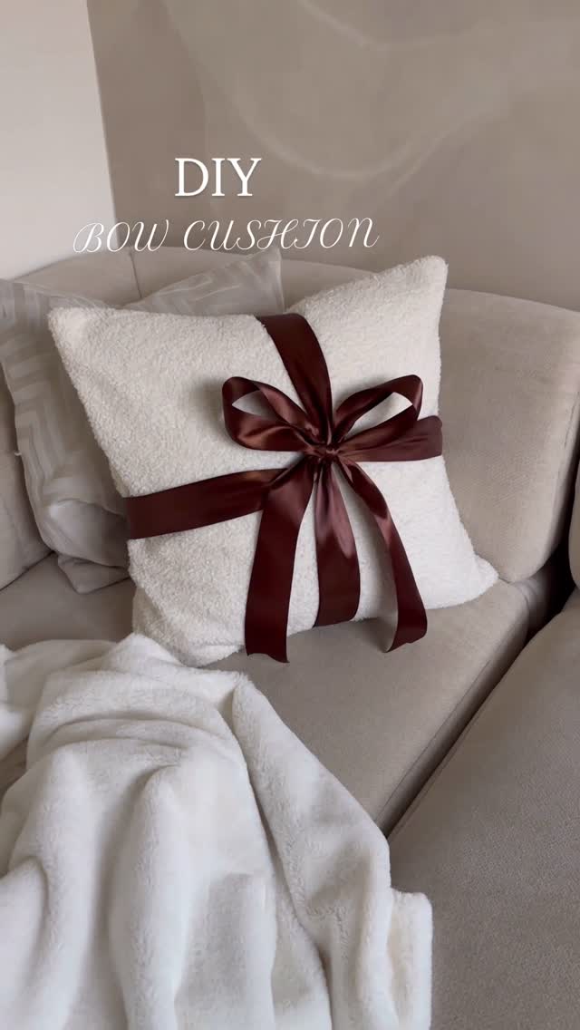 Instagram post by @thechadwick_home for The Range. Caption reads: DIY BOW CUSHION 🎀🤎

Making my colour theme match....