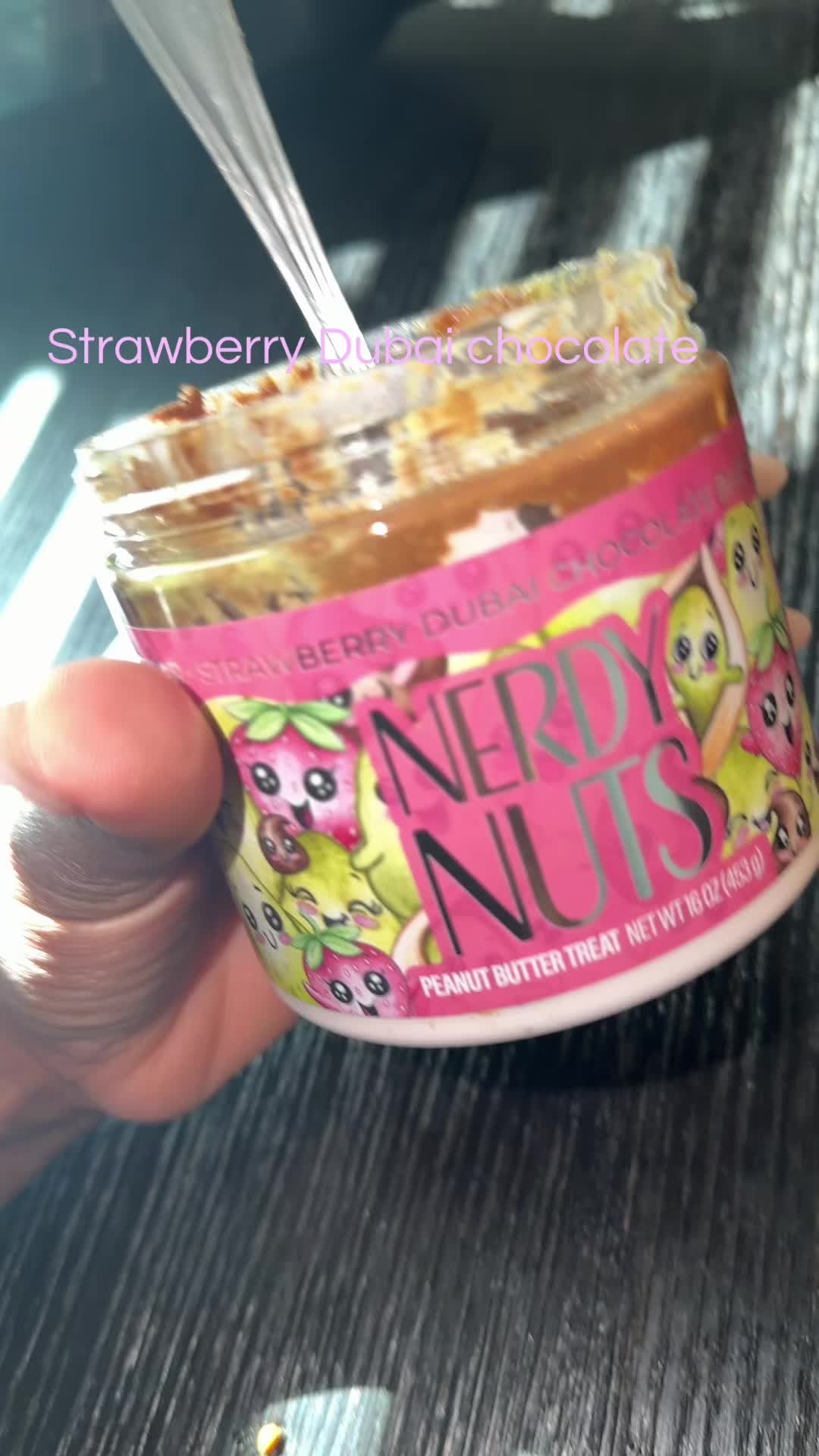 TikTok post by @aniyahnsimmons for Nerdy Nuts. Caption reads: #dubichocolate #nerdynuts #snacks #chocolate....