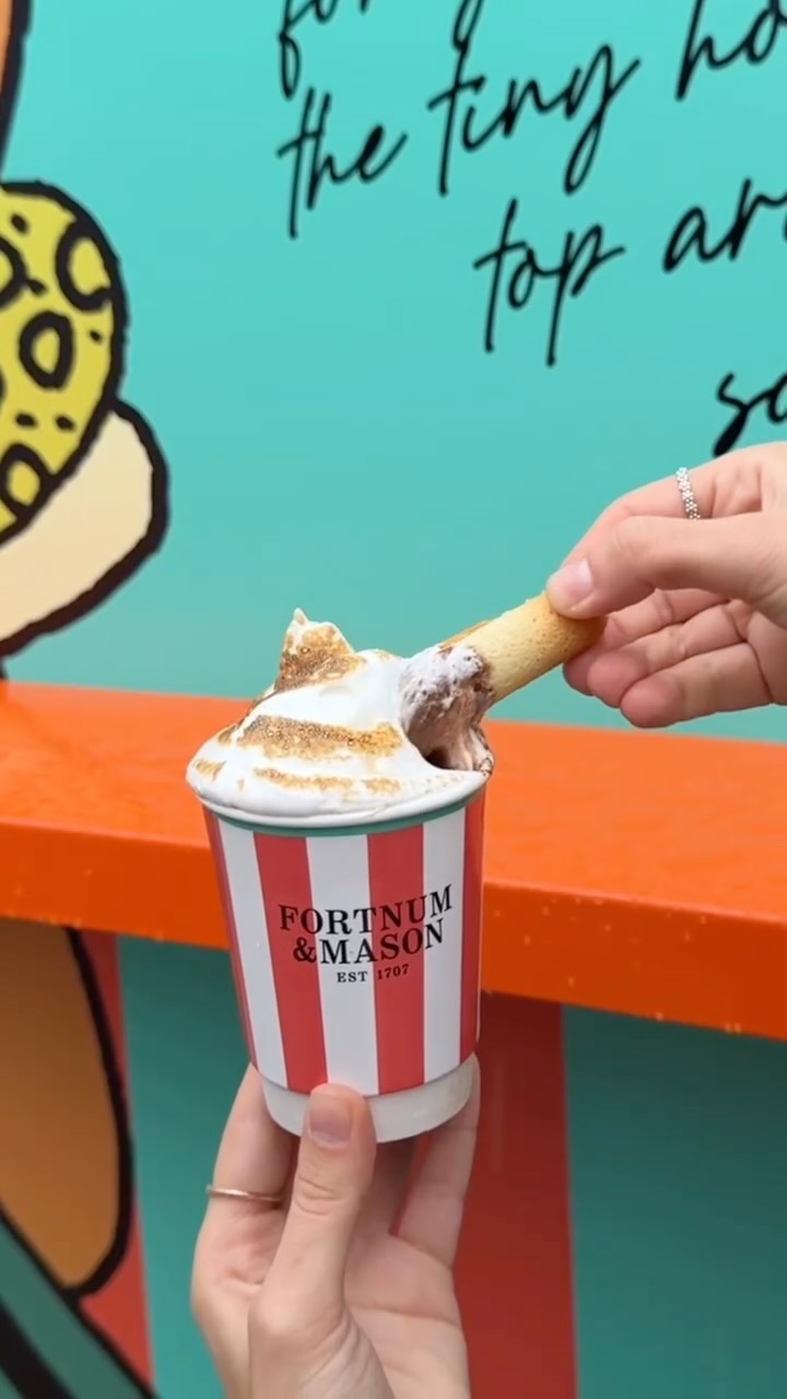 Instagram post by @ritafarhifinds for Bicester Village. Caption reads: A Rainy Day in Bicester: Fashion, Friendship, and....