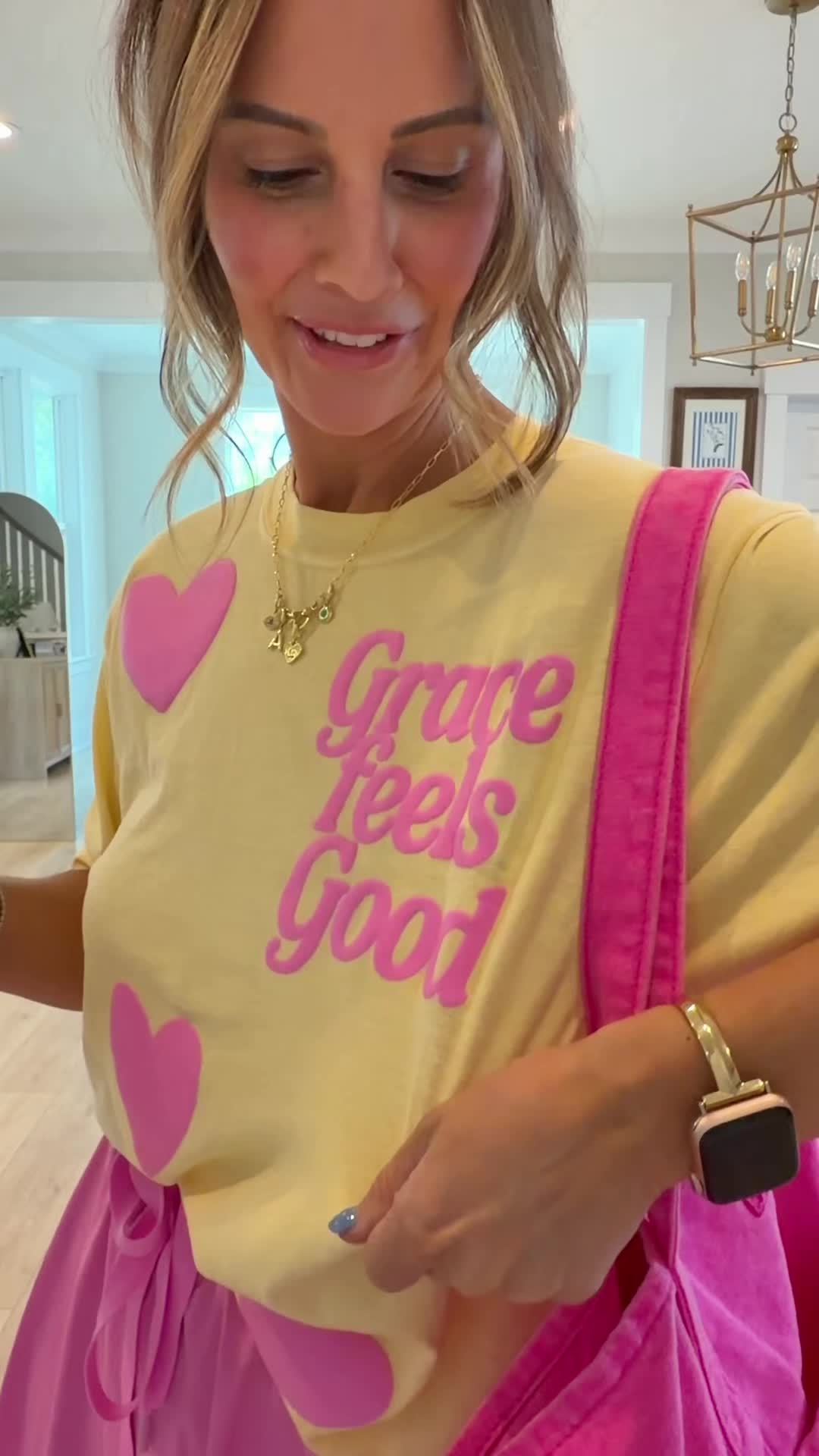 TikTok post by @shelbylowery_ for United Monograms. Caption reads: 🩷☀️🩷☀️🩷 a happy cute shirt! @United Monograms.