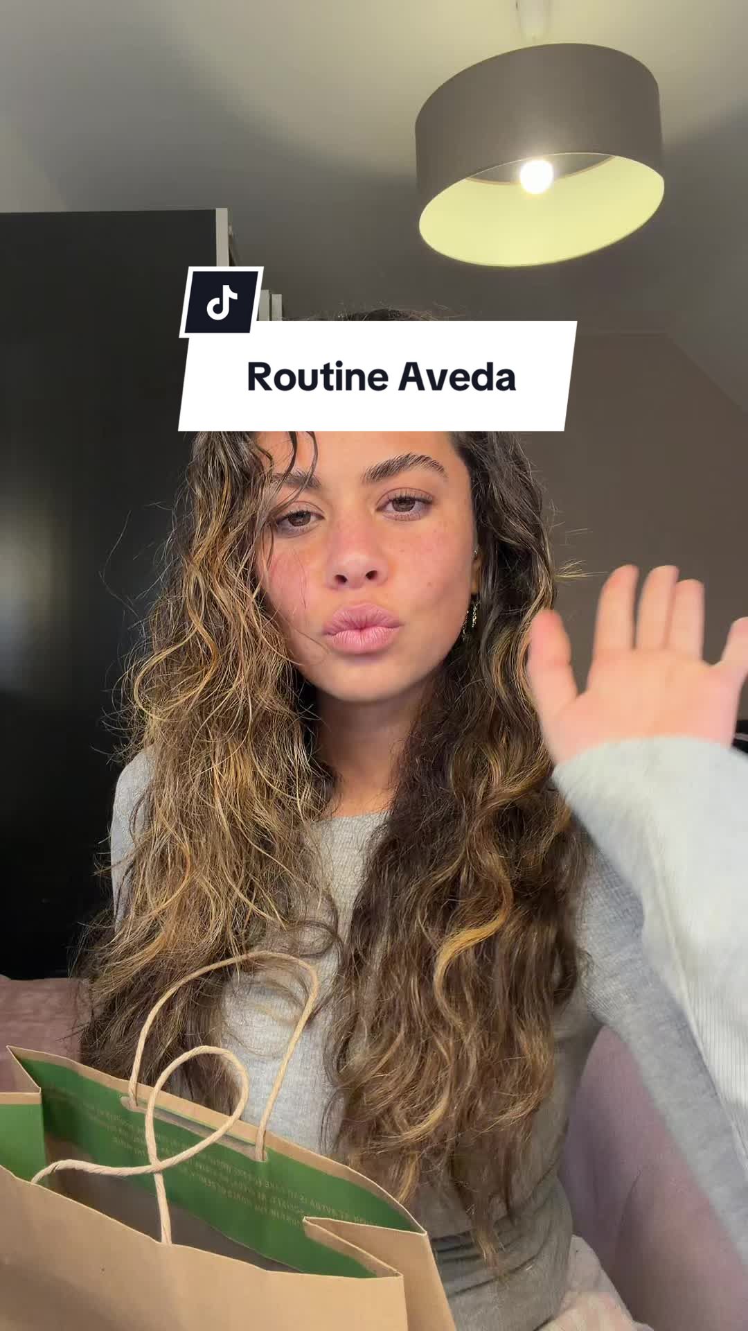 TikTok post by @imanemsss for Aveda. Caption reads: @Aveda #aveda #miraculousoil #botanicalrepair....