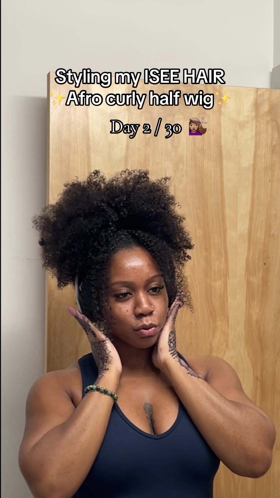 TikTok post by @squatqueenceo for iseehair. Caption reads: Day 2 of my 30 day series styling my Afro curly....