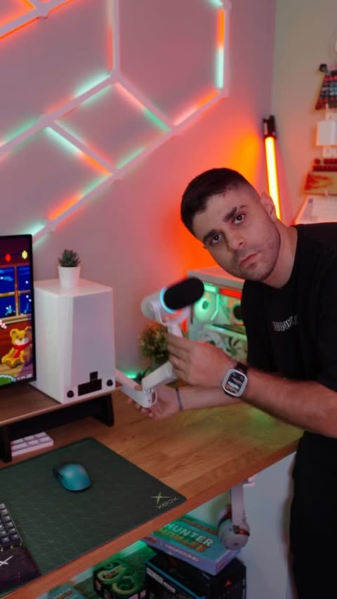 Instagram post by @realgivemchills for Elgato. Caption reads: My boom arm was needed help badly, @elgato came in....