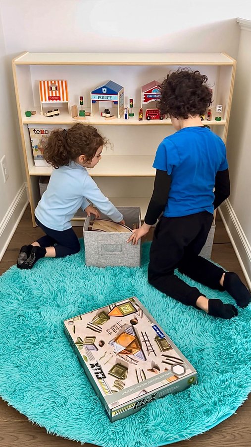 Instagram post by @lovinglylina for Guidecraft. Caption reads: [...] these beautiful wooden shelves from....