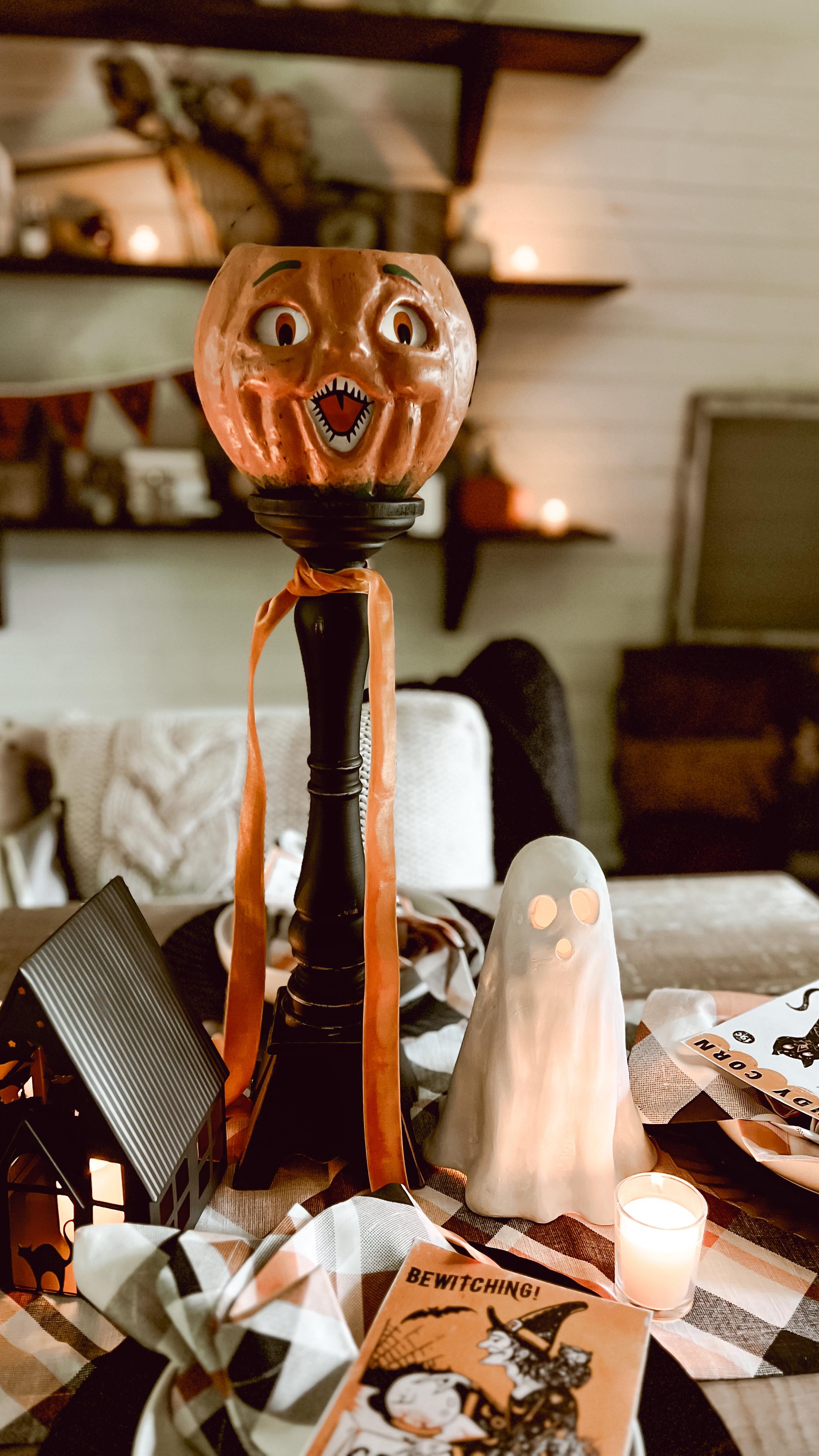Instagram post by @our.cozy.little.home for Better Homes & Gardens. Caption reads: This is your sign to host a Halloween gathering....