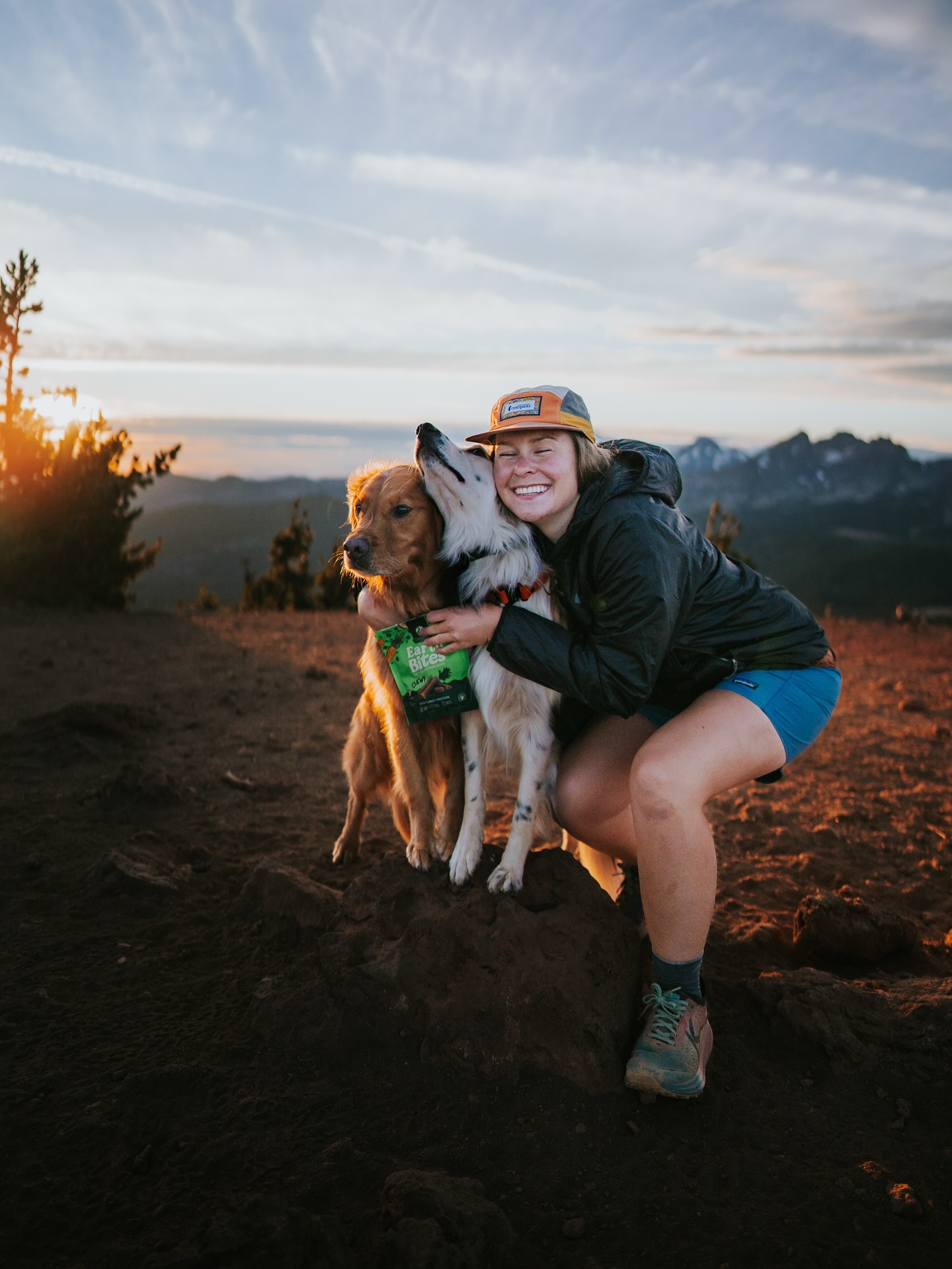 Instagram post by @wildwiththem for Earthborn Holistic Pet Food. Caption reads: I swear they love me 🤭

#ad | but when the....