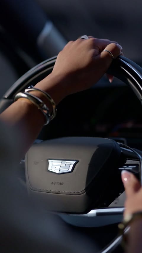 Instagram post by @tiffanylumpkin for Cadillac. Caption reads: [...] is from Detroit and drove a @cadillac 🤣✨ my....
