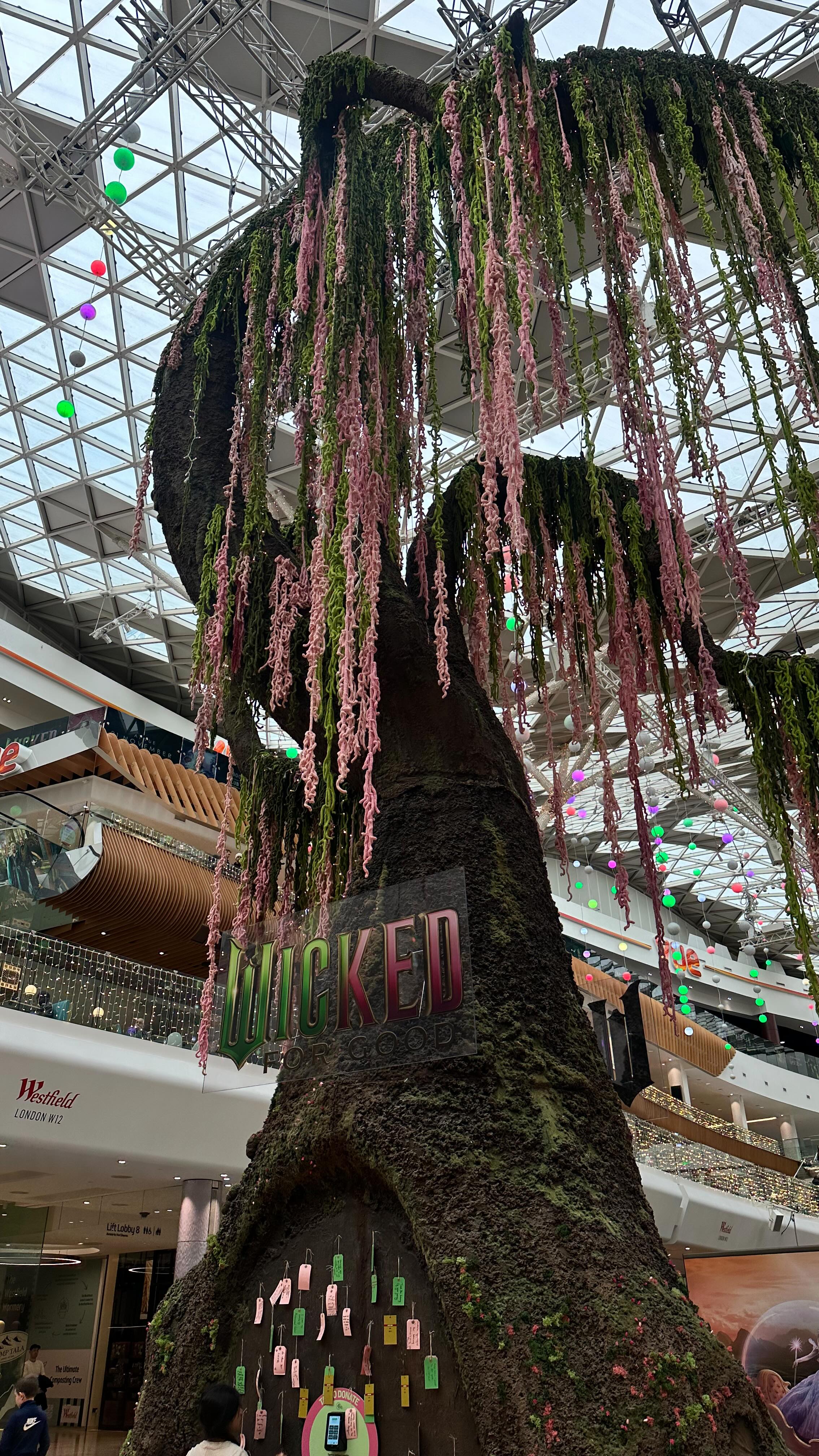 Instagram post by @katie_treasure for Westfield London. Caption reads: loveee watching people shop for angel tree kids so....