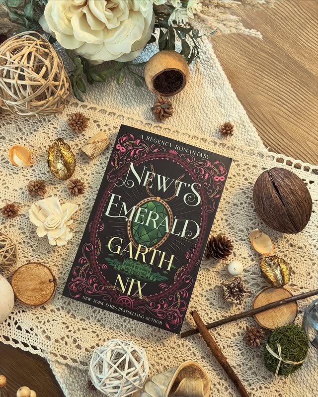 Instagram post by @heartofhomesteadreads for Epic Reads. Caption reads: 𝗧𝗵𝗲 𝗡𝗲𝘄𝘁’𝘀 𝗘𝗺𝗲𝗿𝗮𝗹𝗱 𝗯𝘆 𝗚𝗮𝗿𝘁𝗵....