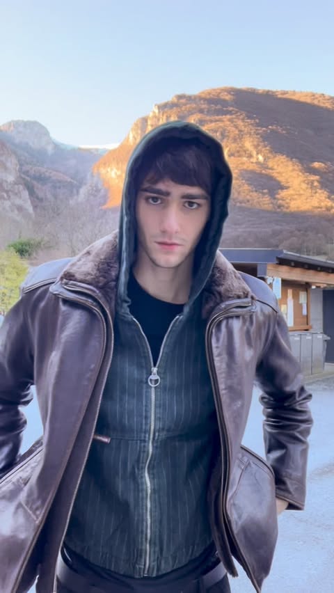 Instagram post by @_marco_suardi for KARL LAGERFELD. Caption reads: happy new year🍾❤️
 
hoodie: @scuffers.co 
shirt:....