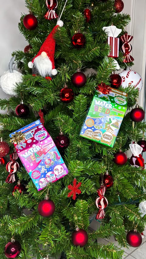 Instagram post by @cloandmyminis_ for The Entertainer. Caption reads: AD| Water Bead Magic from @curiousuniverseuk 🫧✨....