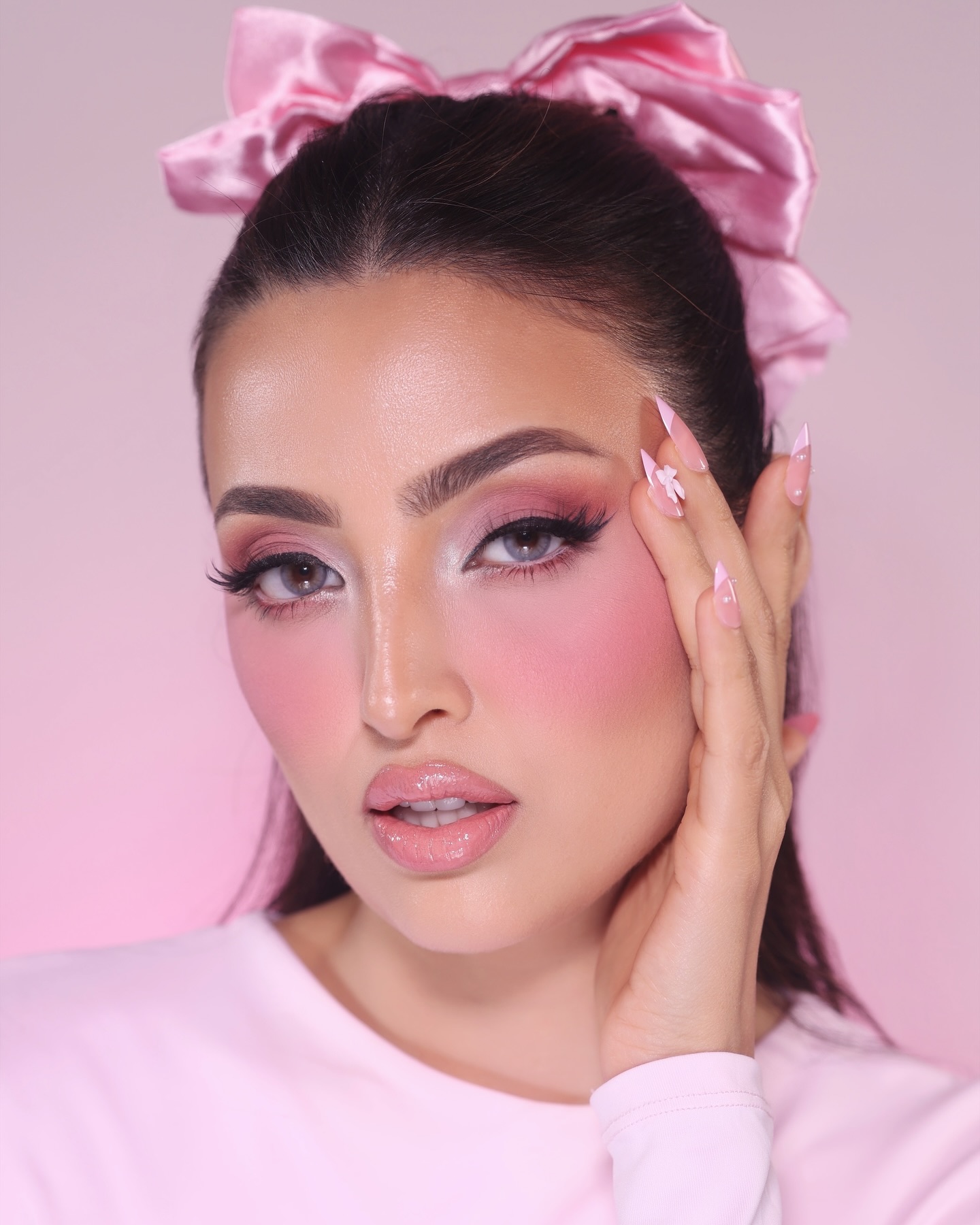 Instagram post by @sanaakofficial for Charlotte Tilbury. Caption reads: Doll blush moment 💗 

Wearing @charlottetilbury....