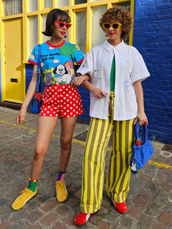 Instagram post by @novasistas for Cambridge Satchel. Caption reads: Hold off packing your summer wardrobe away 🙅‍♀️....