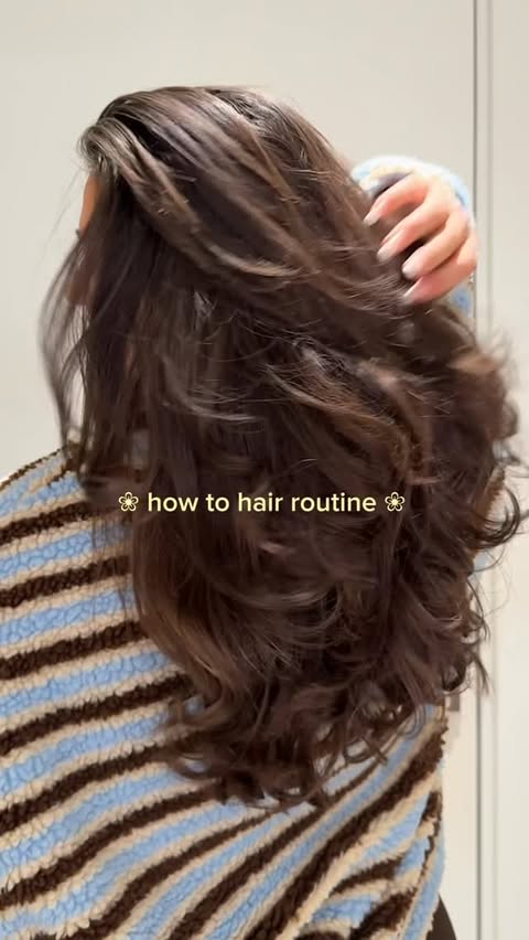Instagram post by @jocelyntrock for IGK Hair. Caption reads: [...] I achieve my smooth bouncy blowout with....