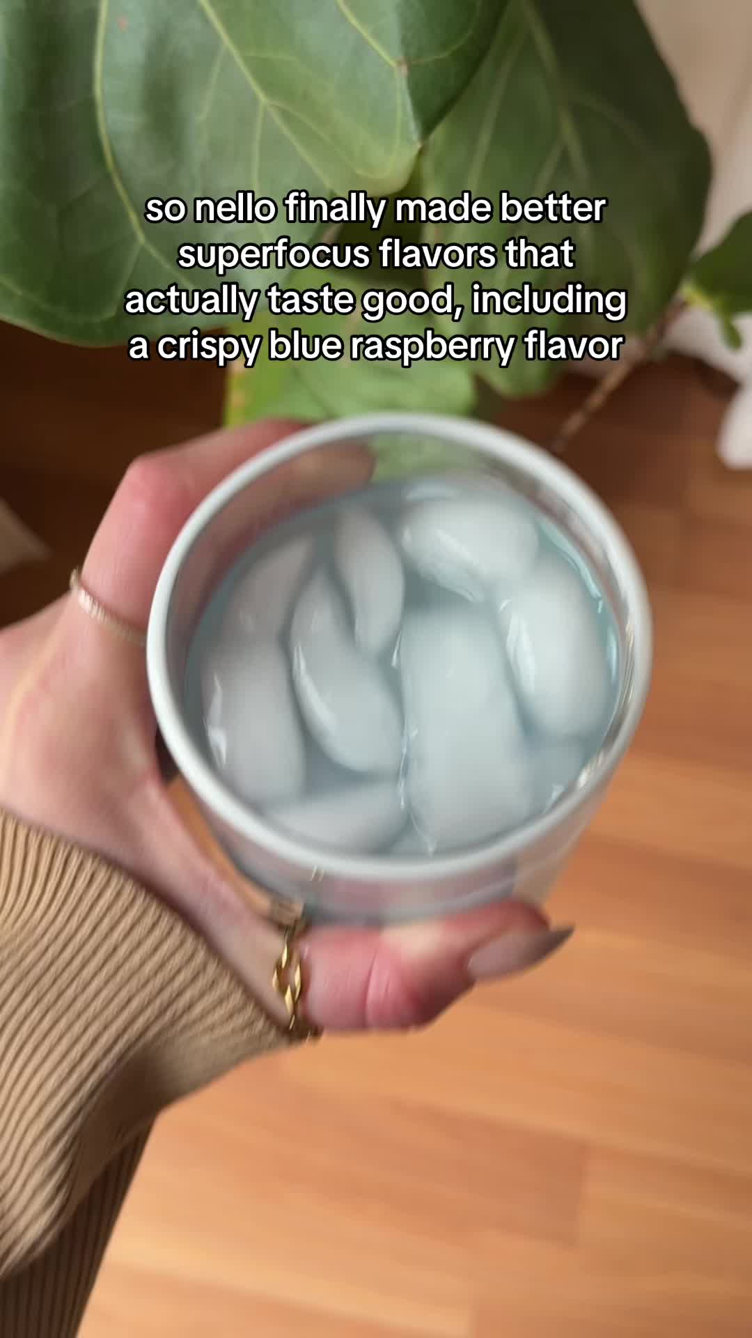 TikTok post by @thatglowupmom for drinknello. Caption reads: blue raspberry is going to go so hard! #superfocus....