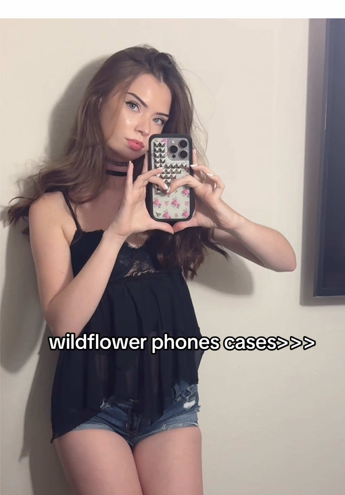 TikTok post by @jaydecrutledge for Wildflower Cases. Caption reads: I 🫶🏻 @Wildflower Cases .