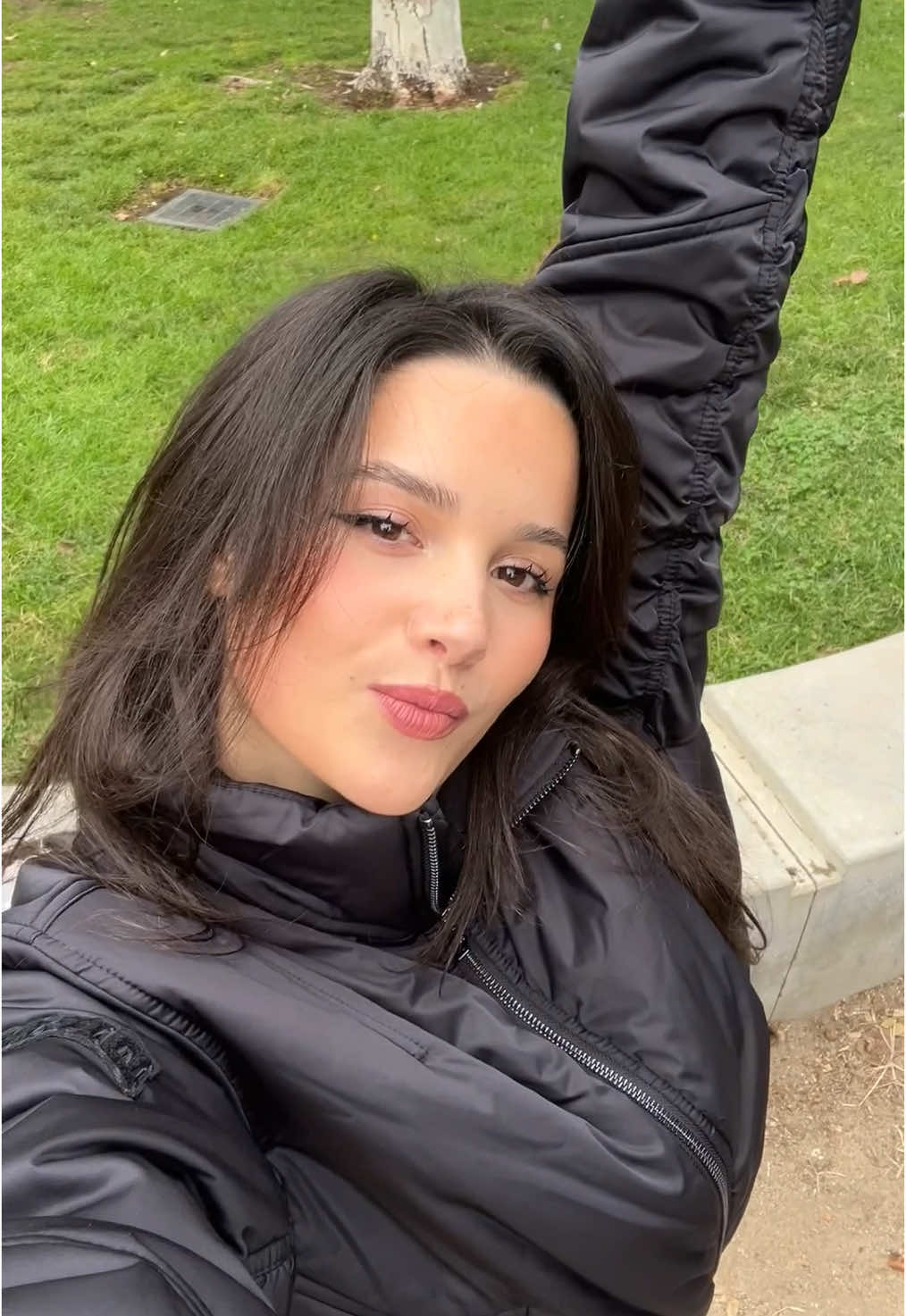 TikTok post by @julesleblanc for DKNY. Caption reads: essential fall puffers with @DKNY #DKNYPartner .