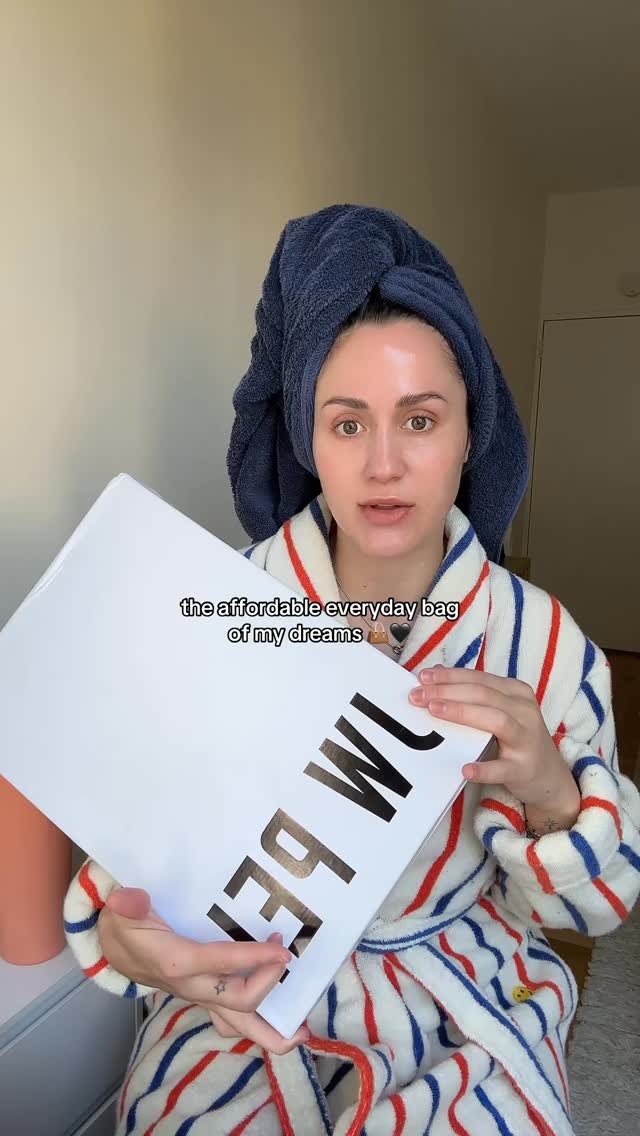 Instagram post by @jordynwoodruff for JW PEI. Caption reads: I’m so proud of her 💼🖤
.
.
#purse #bag....