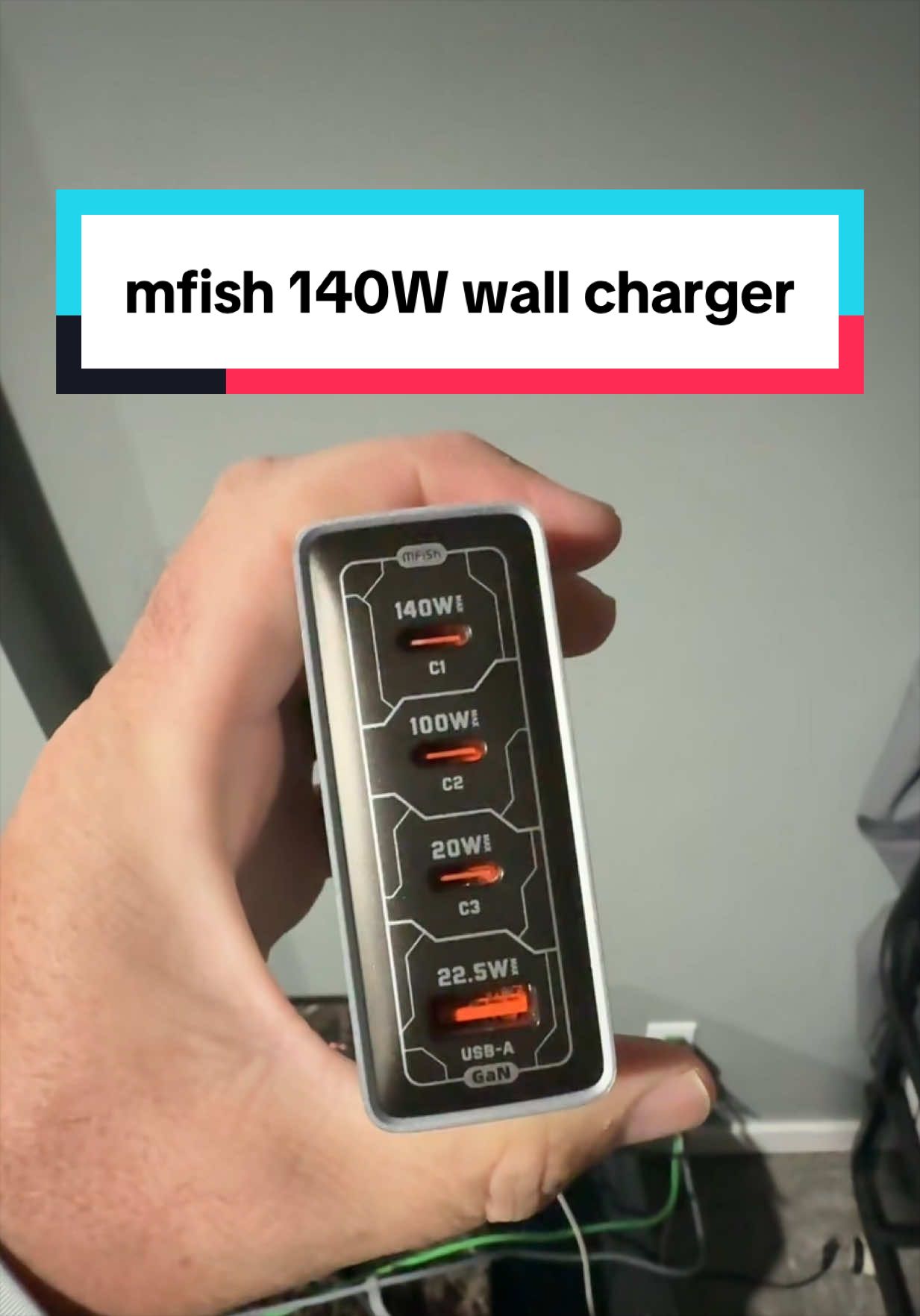 TikTok post by @the.reel.family.shop for Mfish Tech Inc. Caption reads: [...] #phonecharger #travelcharger @mfish tech inc.