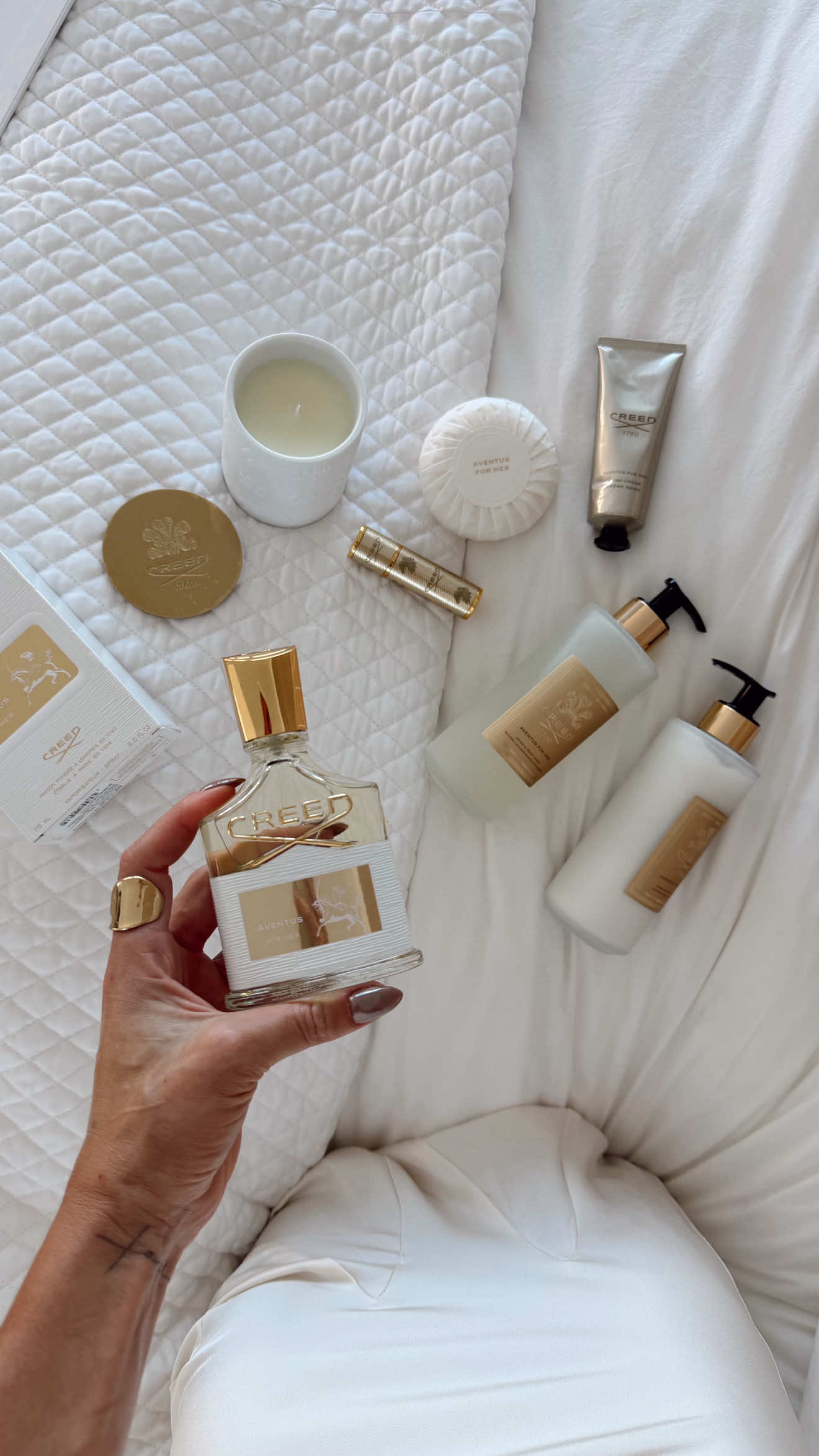 TikTok post by @camilacoelho for Creed Fragrance. Caption reads: [...] the holiday season wrapped in....