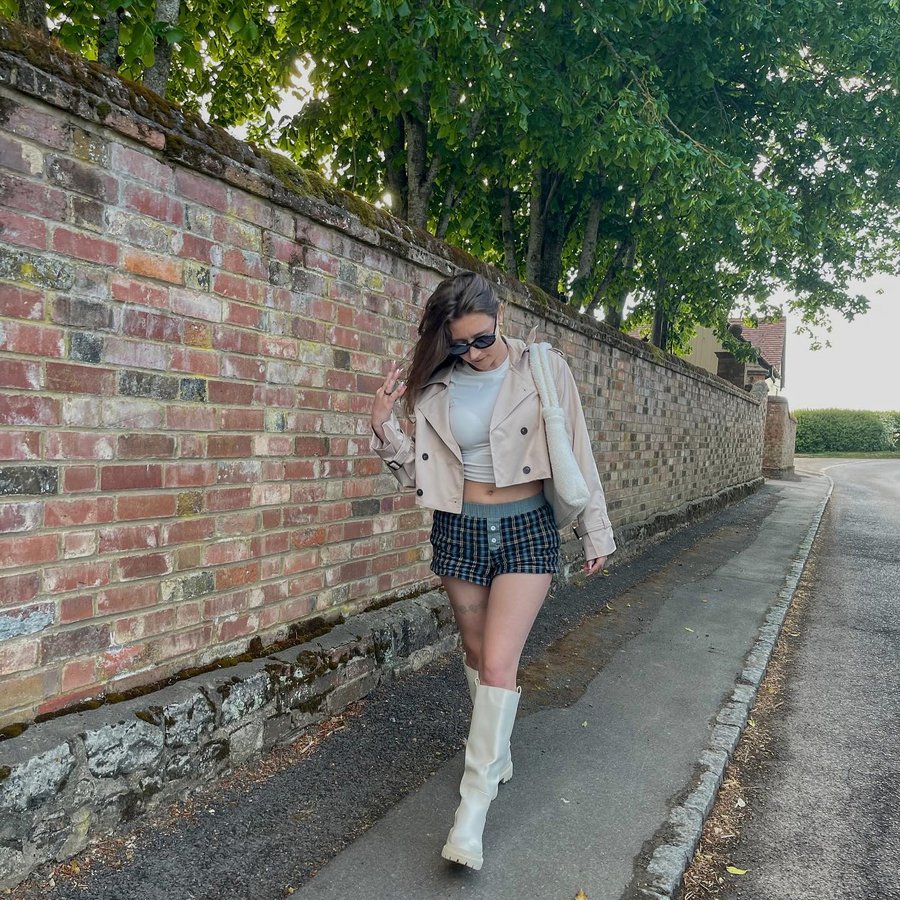 Instagram post by @alittleamy.x for Femme Luxe. Caption reads: 🧥🧸 @femmeluxefinery AD spring outfits | petite....