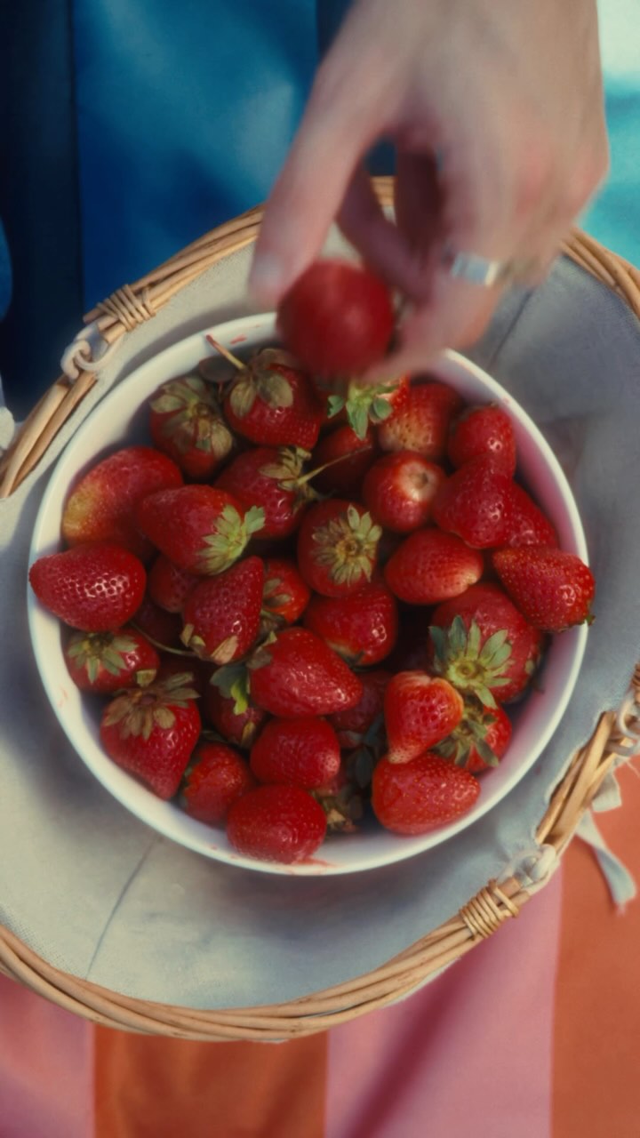 Instagram post by @i.min.official for Epidemic Sound. Caption reads: This is what summer sounds like 🍓 Strawberry Acai....