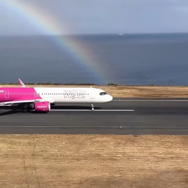 Instagram post by @madeiraairportspotting for Wizz Air. Caption reads: Wizzair chasing the rainbow 🌈 

#madeira #airport....