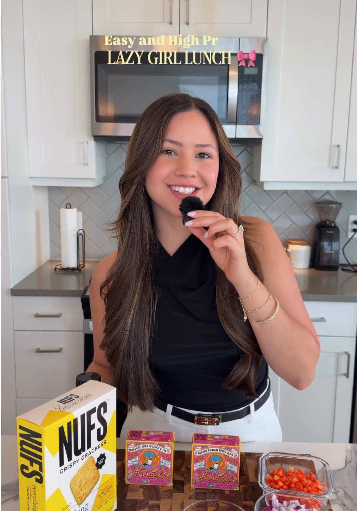 TikTok post by @sizzlewithgaby for Fishwife. Caption reads: [...] in spicy olive oil (is not that spicy)....