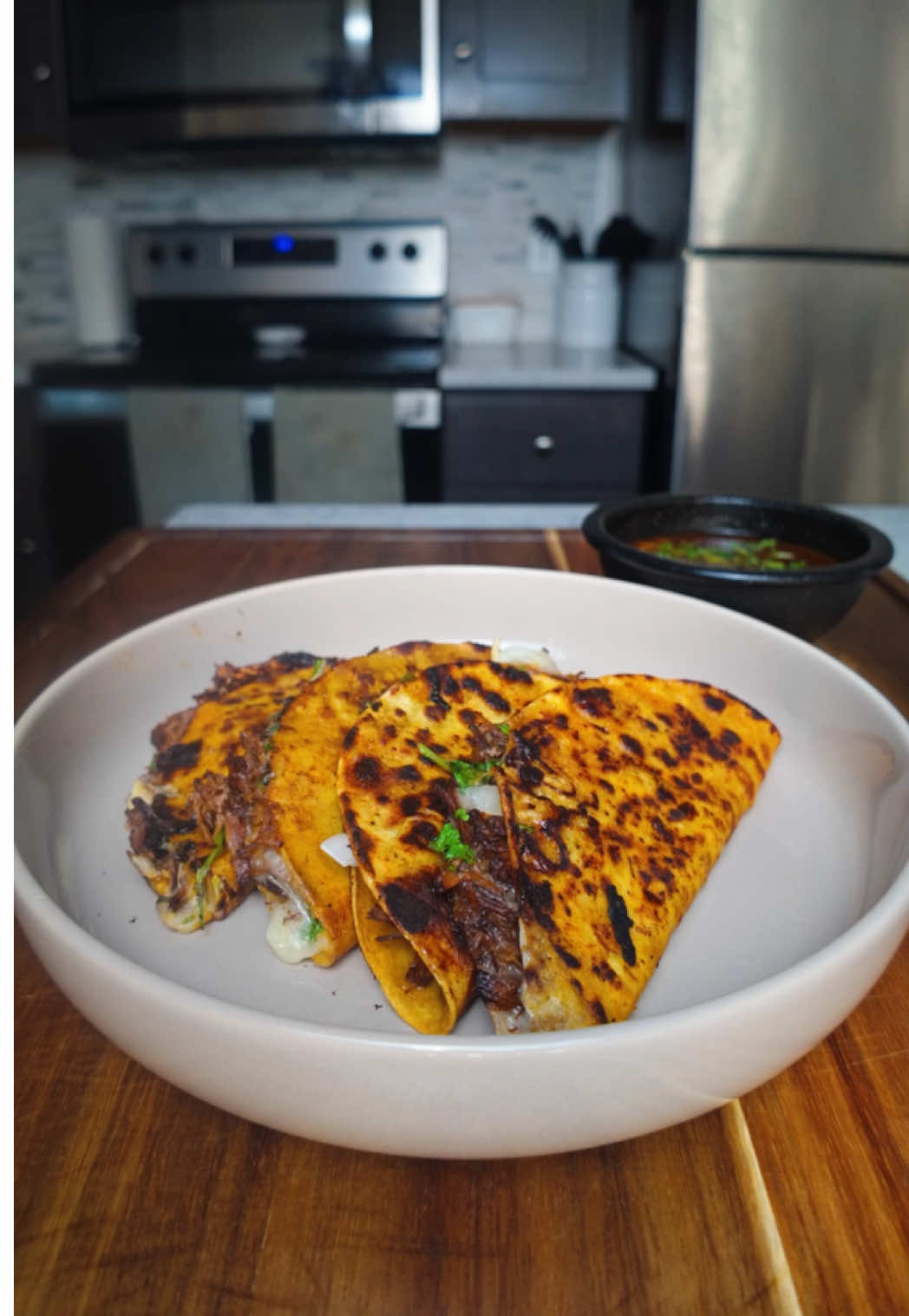 TikTok post by @marcanthonyfit for EZ Bombs. Caption reads: Quesabirria Tacos 🌮  🔹Ingredients: BIRRIA * 2-3....