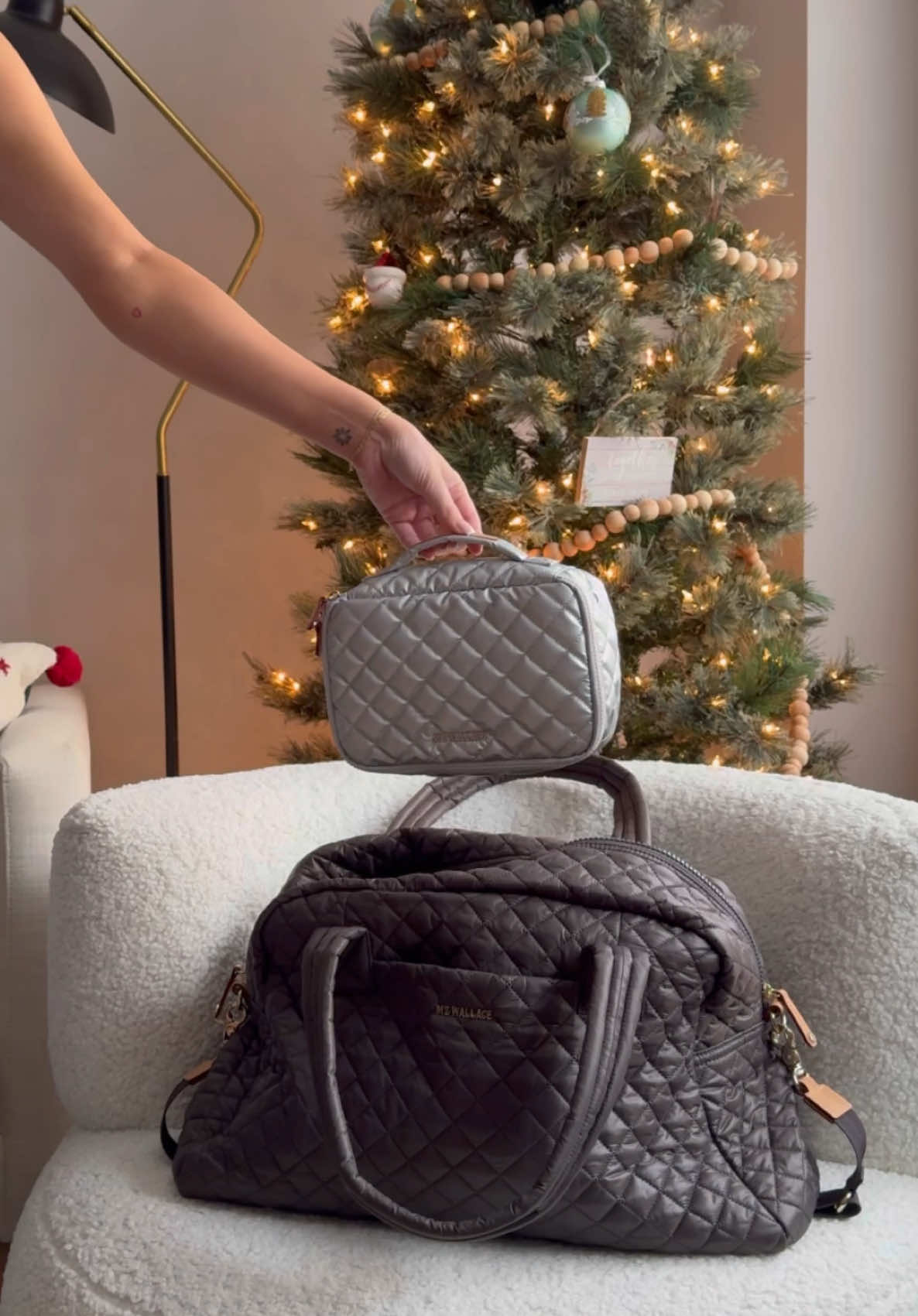 TikTok post by @maggiemccormackk for MZ Wallace. Caption reads: The only weekender bag I trust @MZ Wallace #ad.