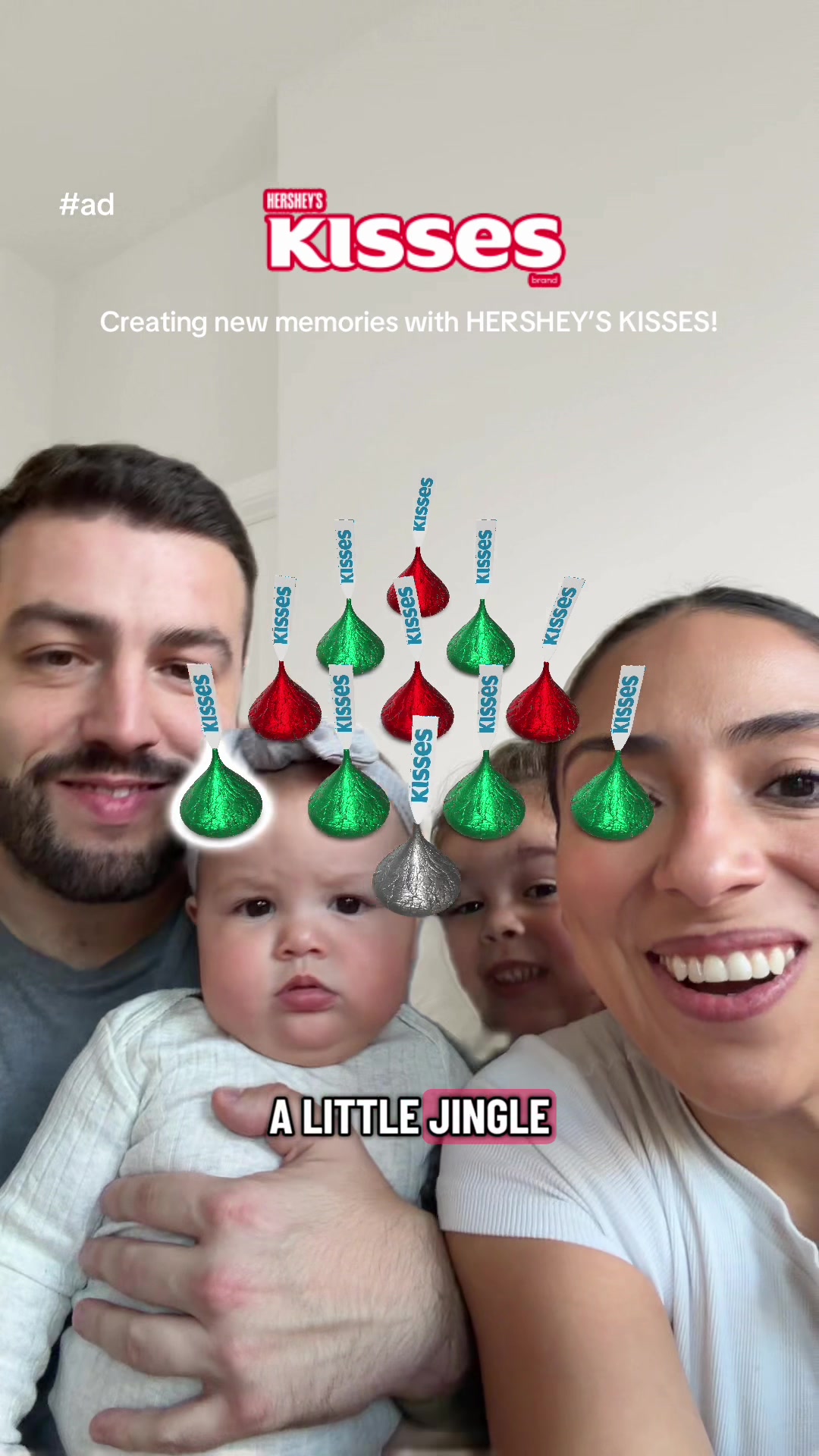 TikTok post by @joeyandcynthia for Hersheyland. Caption reads: #ad You know that @Hershey’s KISSES bells....