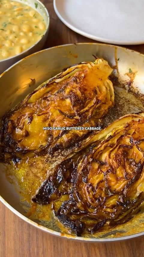 Instagram post by @alfiecooks for OXO. Caption reads: [...] cabbage 🤤 AD seared to perfection in my....