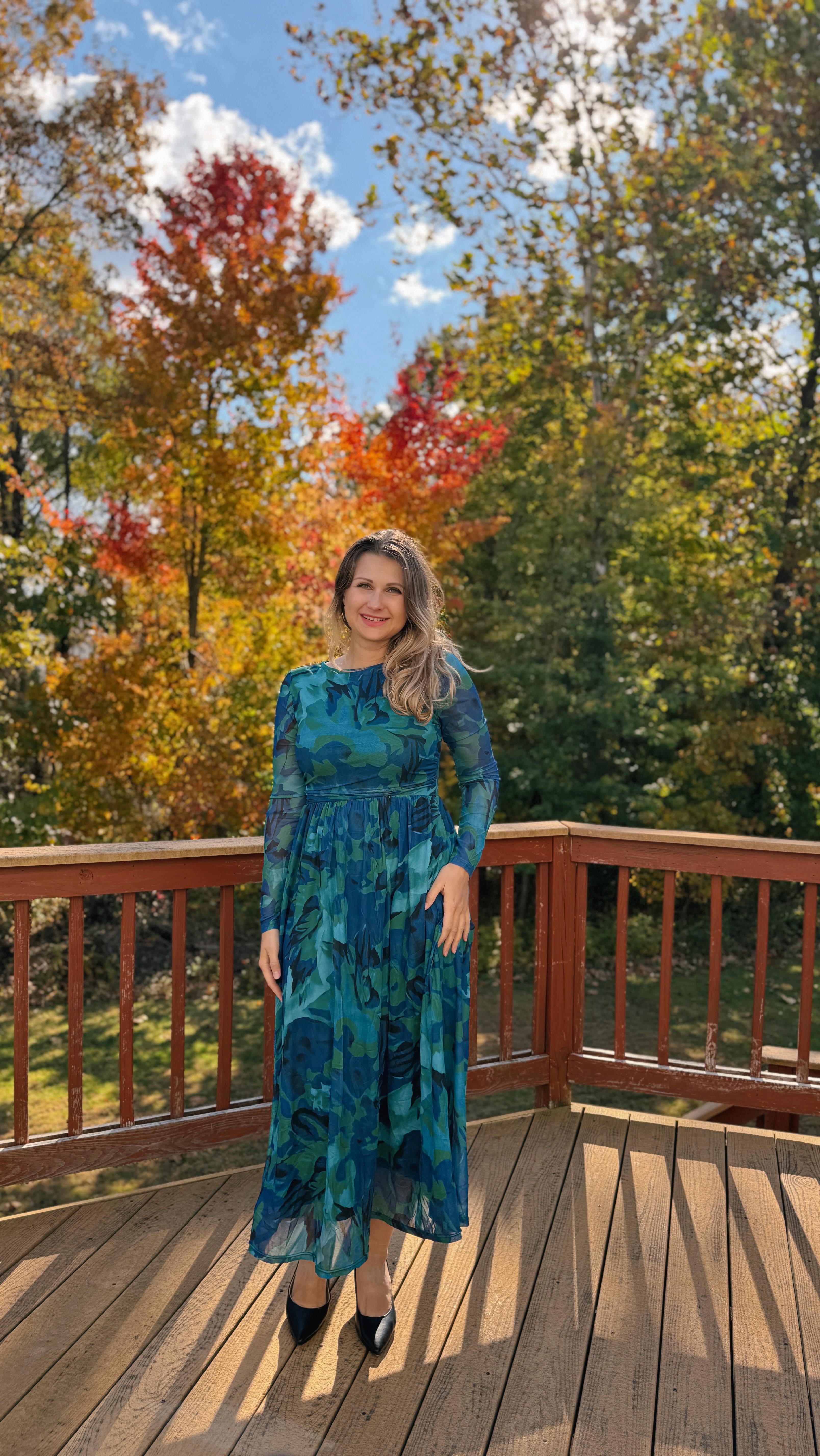 Instagram post by @natalia_usa for Merokeety. Caption reads: [...] 🤍 Loving this chic dress and cozy cardigan....