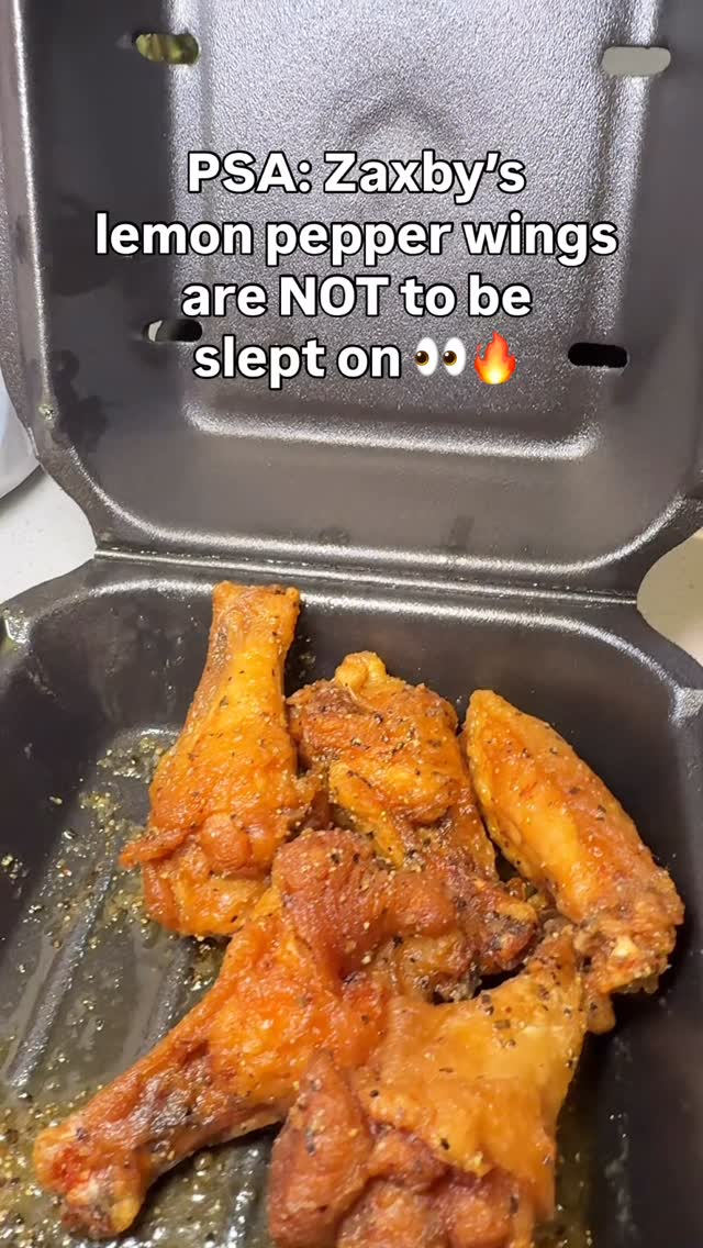 Instagram post by @foodiebawse for Zaxby's. Caption reads: PSA: Zaxby’s lemon pepper wings are NOT to be....