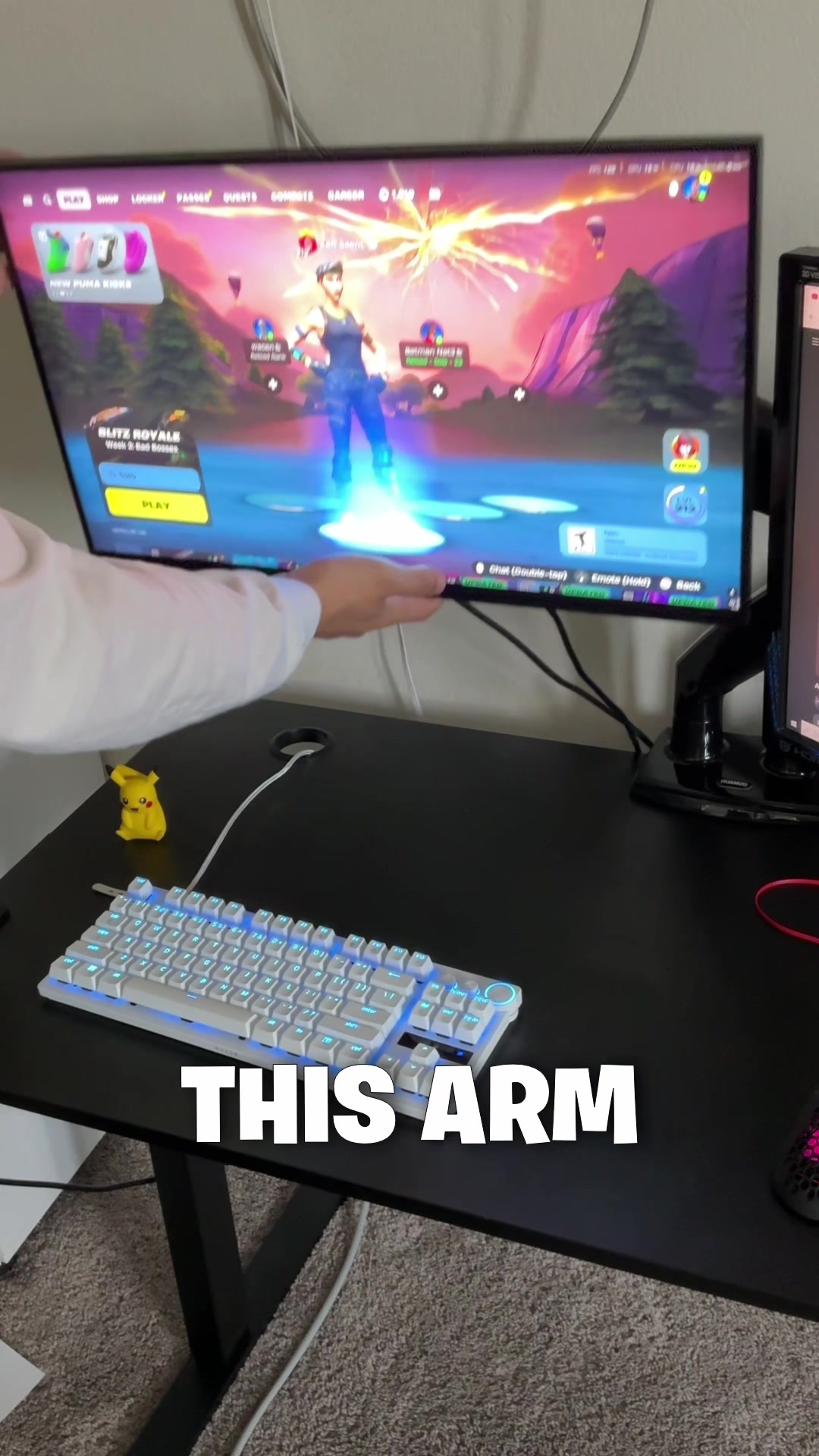 TikTok post by @devoursilent for HUANUO. Caption reads: [...] setup! My brand new monitor arms by @HUANUO....