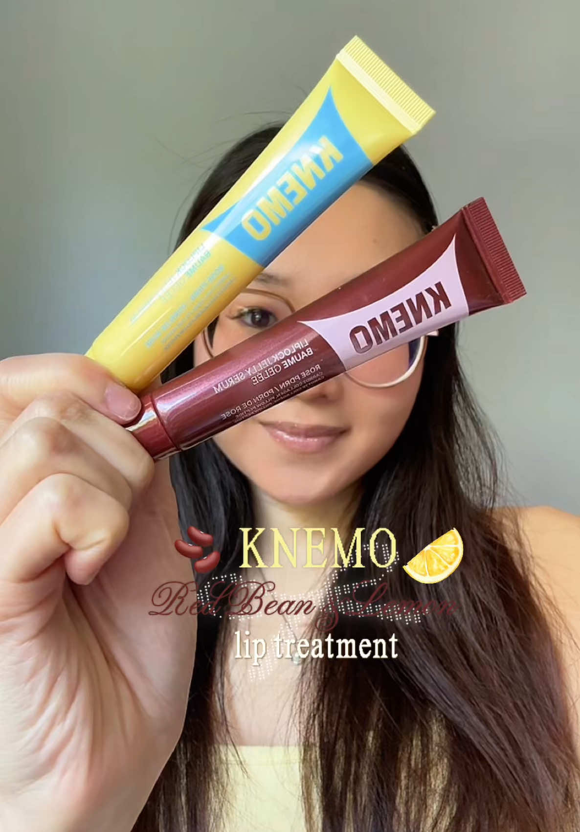 TikTok post by @strawberriezsnz for Knemo Beauty. Caption reads: @KNEMO™ red bean and lemon lip treatment 🫘🍋 I....