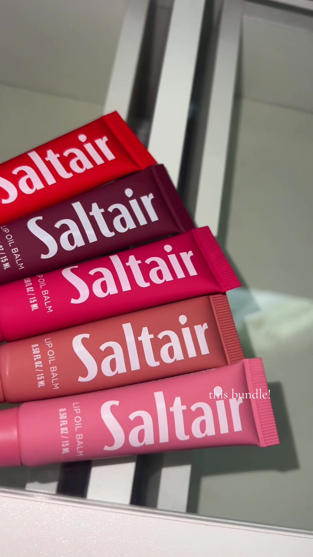TikTok post by @sienna_picard for Saltair. Caption reads: these lip oil balms are SO good!! And smell....