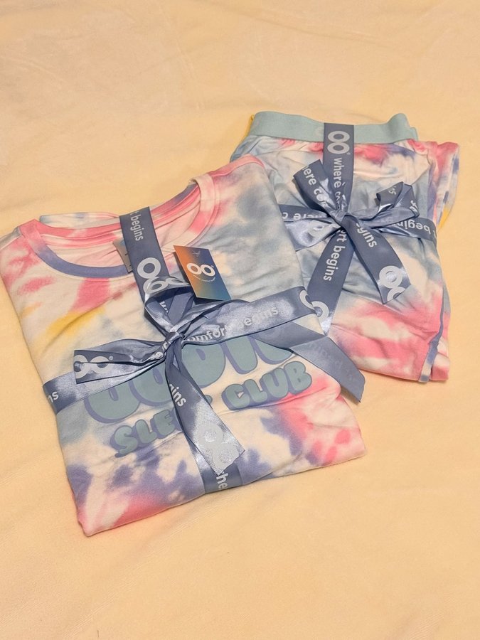 Instagram post by @cleanaway20 for The Oodie. Caption reads: ☁️These PJs are a dream! ☁️

The Bright Tie-Dye....