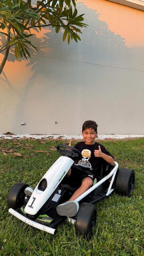 Instagram post by an influencer for Garvee. Caption reads: [...] racer in the making. 🏁✨ @garvee_official 🔗....
