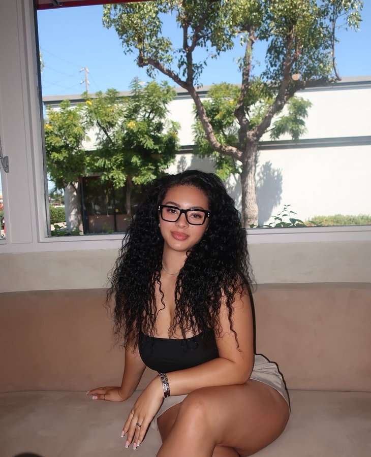 Instagram post by @_mulaan for OOTDY. Caption reads: [...] use my code something off your next look....