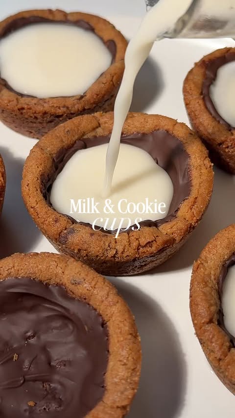 Instagram post by @booboosbakeryy for Almond Cow. Caption reads: 🎄 Day 12 of 12 Days of Christmas Cookies: Milk &....