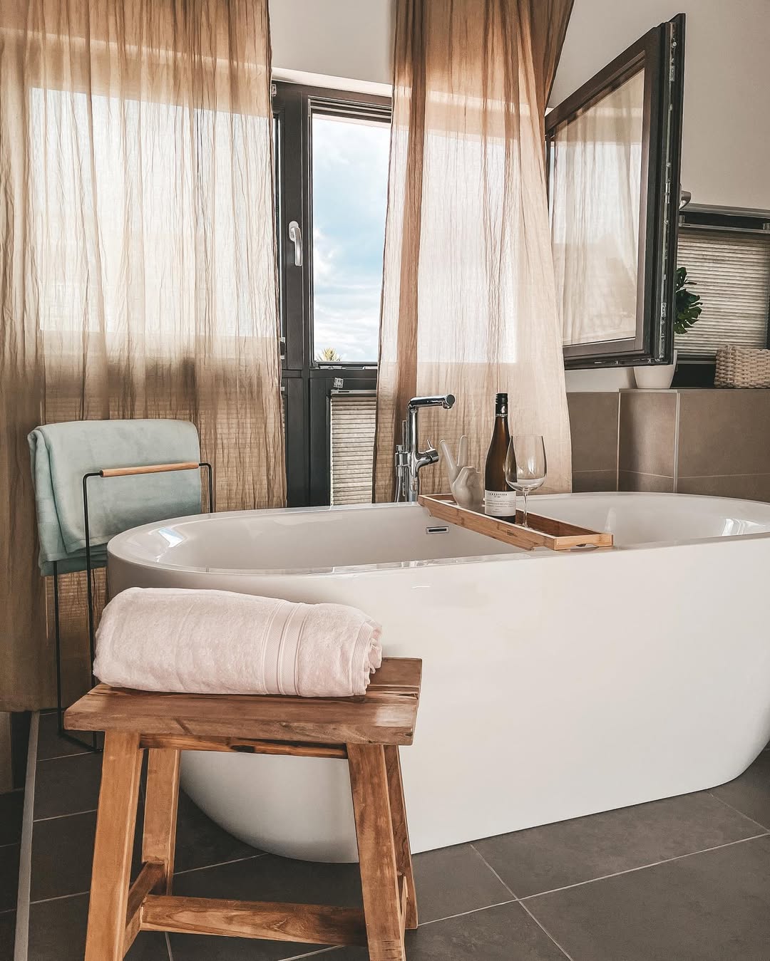 Instagram post by @sabinamarkin for Jotex. Caption reads: summer breeze 🌱 
Wie gefällt euch unser Bad 🛁?....