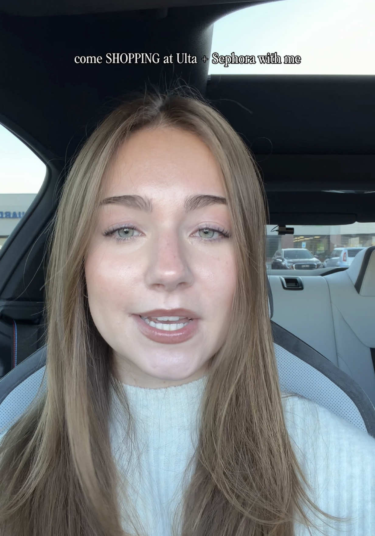 TikTok post by @theglownarrative for Touchland. Caption reads: [...] @Miu Miu @Milani Cosmetics @Saie @Rare....